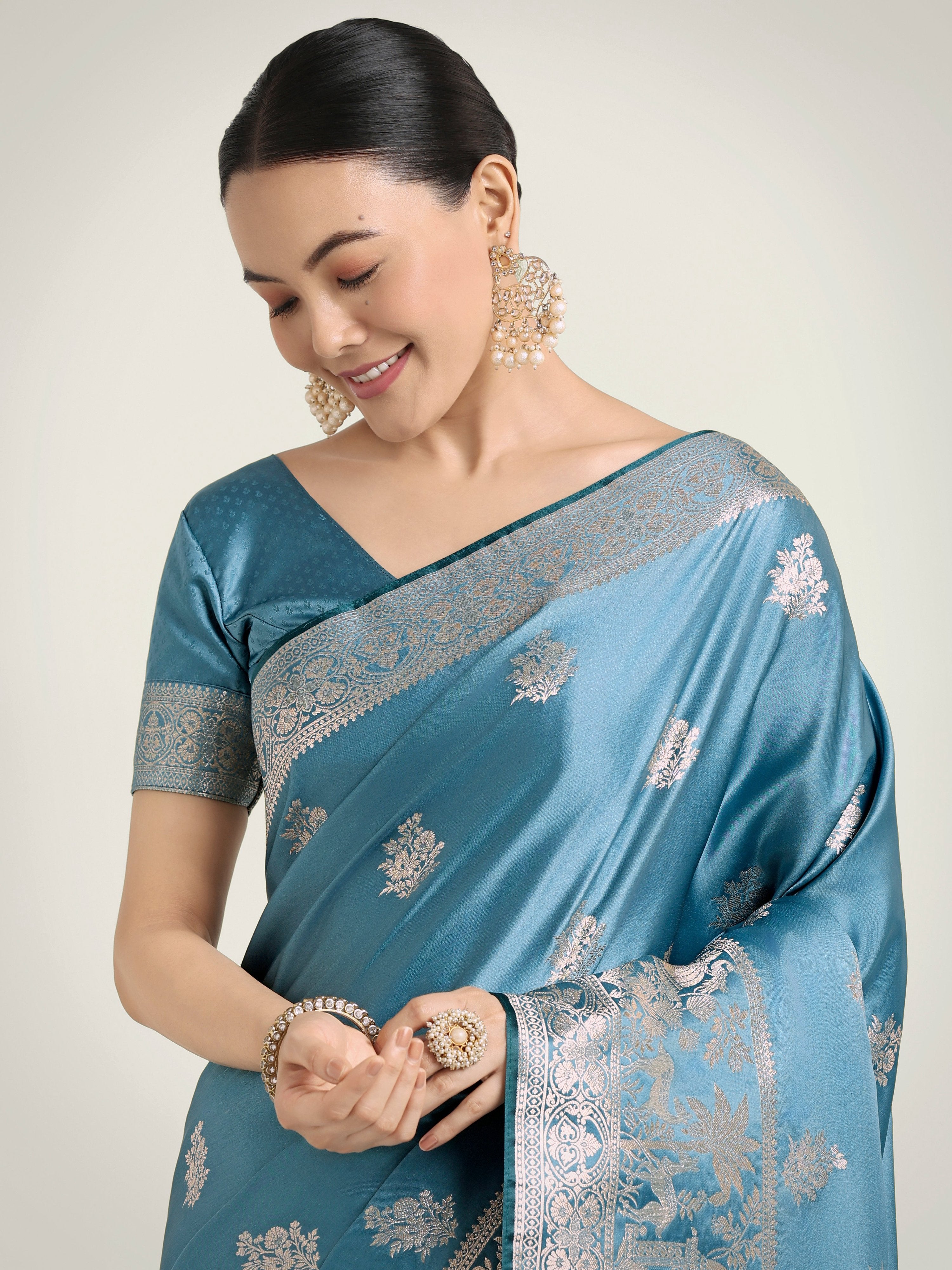 Monjolika Fashion Cyan blue Zari Weaving Work Banarasi Satin Silk Traditional Saree