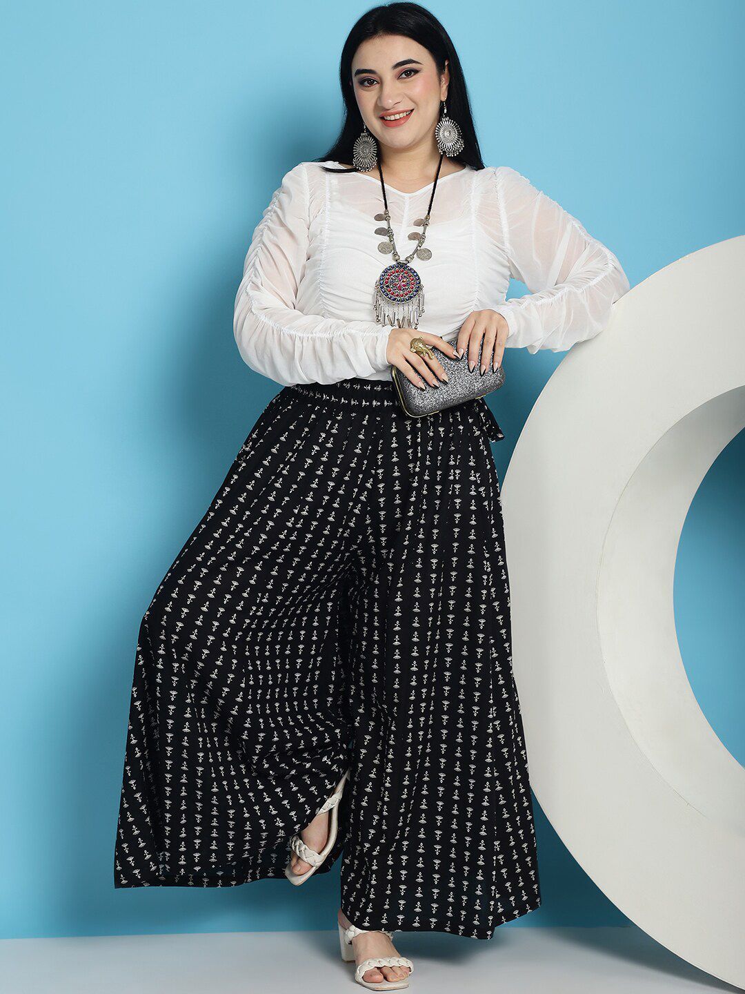 TAG 7 Women Floral Printed Flared Pure Cotton Palazzos