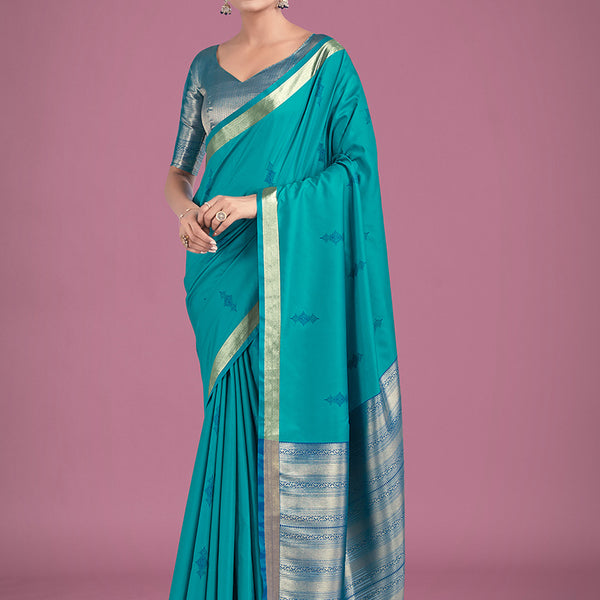 Monjolika Fashion Charming Turquoise Color Silk Golden Zari Woven Ceremony Saree