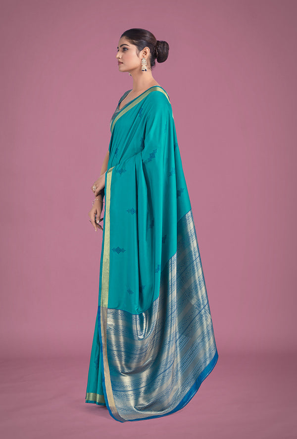 Monjolika Fashion Charming Turquoise Color Silk Golden Zari Woven Ceremony Saree