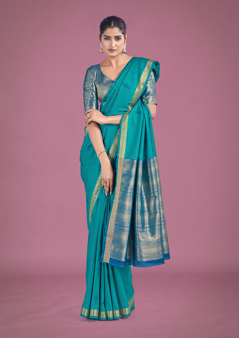 Monjolika Fashion Charming Turquoise Color Silk Golden Zari Woven Ceremony Saree