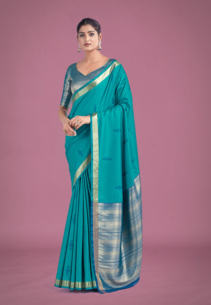 Monjolika Fashion Charming Turquoise Color Silk Golden Zari Woven Ceremony Saree