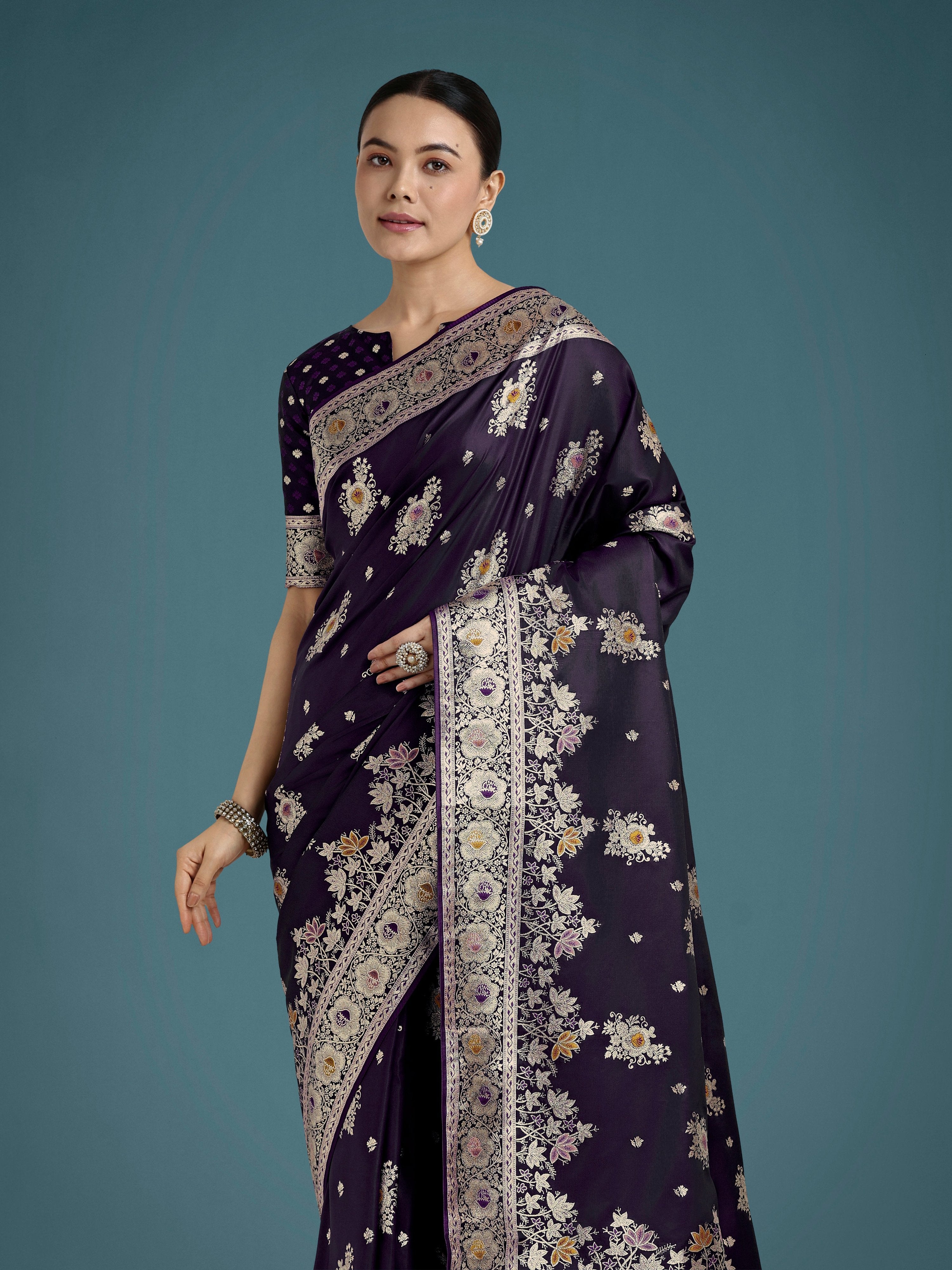 Monjolika Fashion Dark Purple Glamour and Tradition With This Zari Woven Banarasi Satin Silk Saree