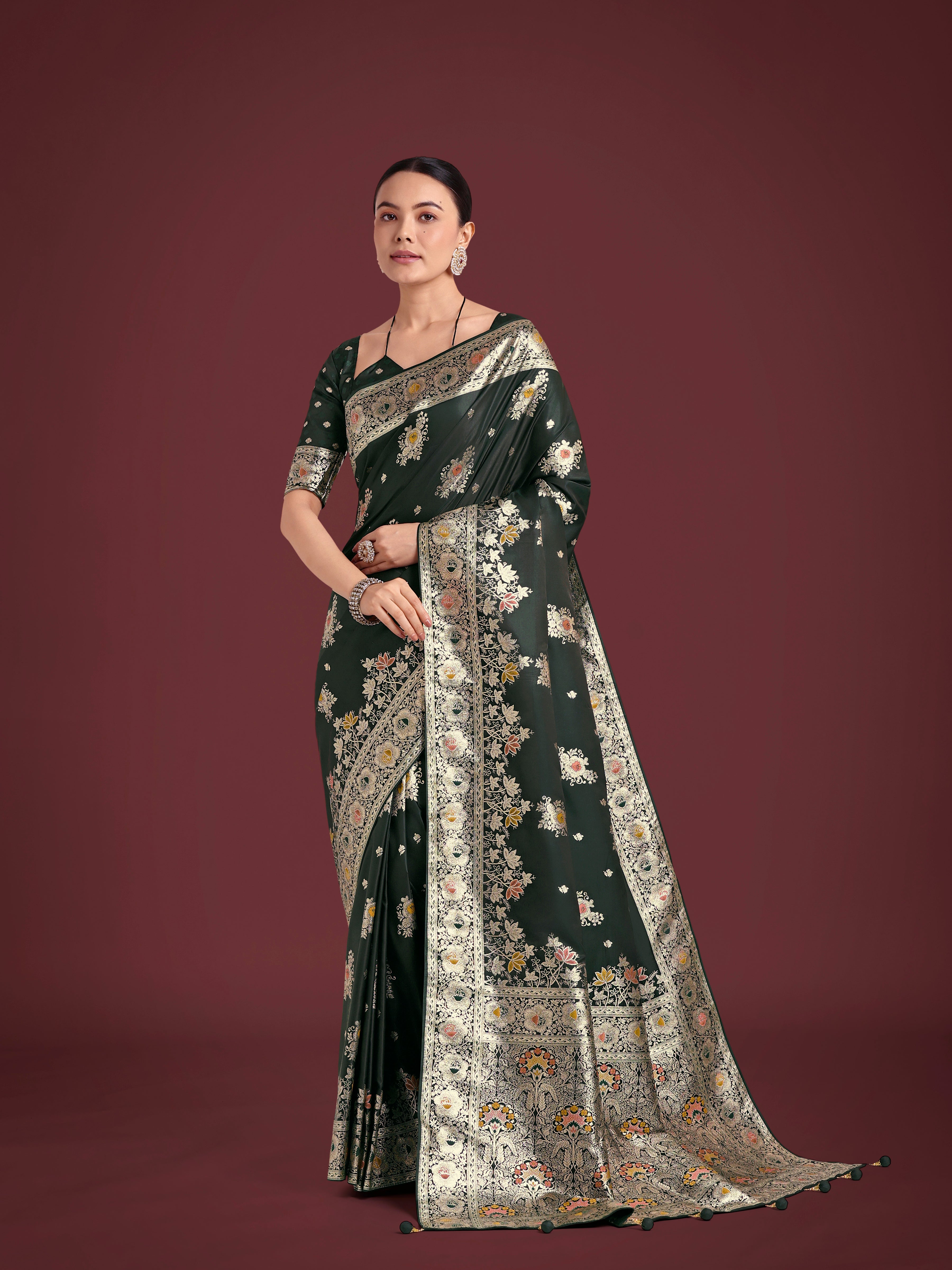 Monjolika Fashion Dark Green Glamour and Tradition With This Zari Woven Banarasi Satin Silk Saree