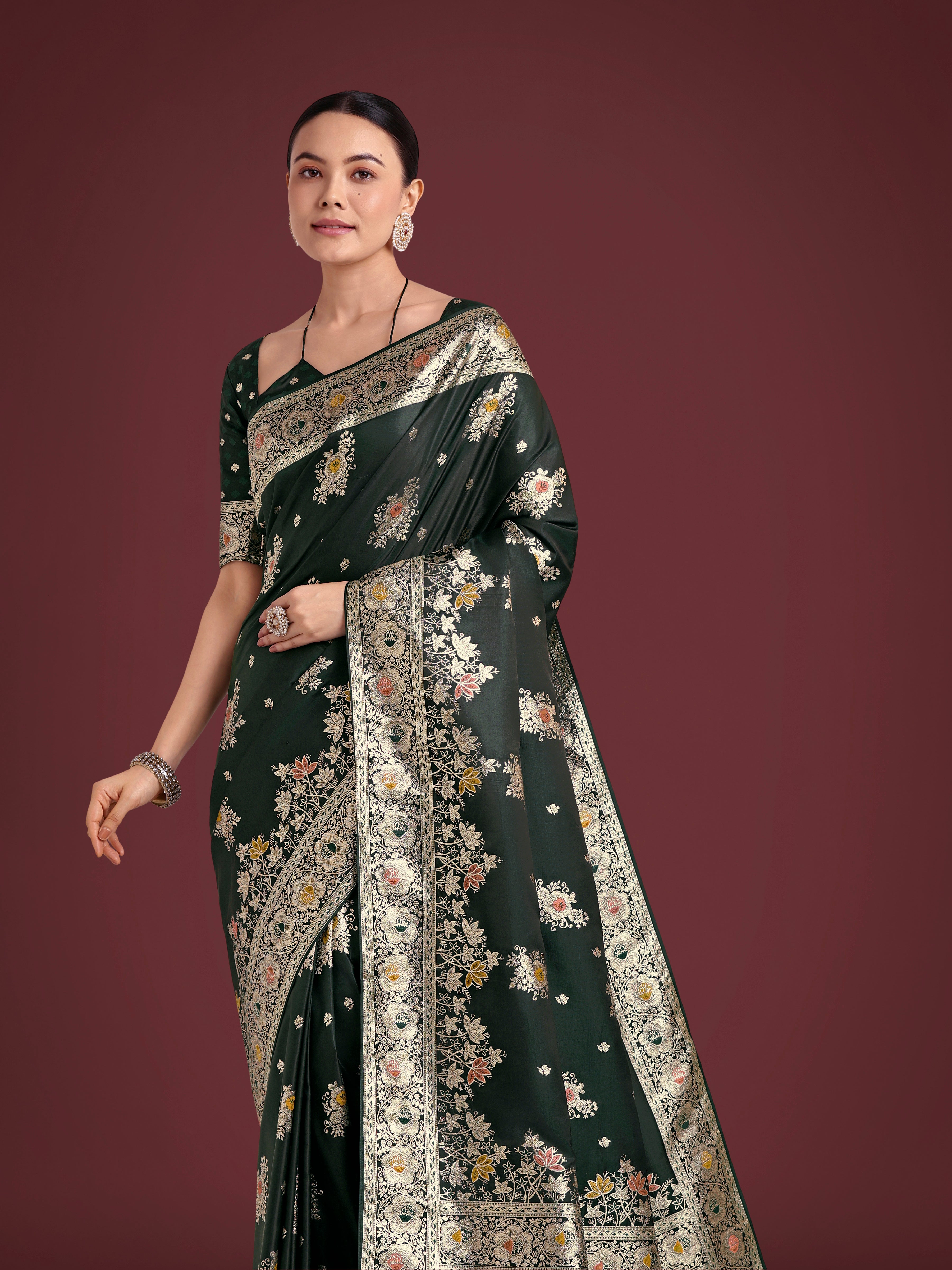Monjolika Fashion Dark Green Glamour and Tradition With This Zari Woven Banarasi Satin Silk Saree