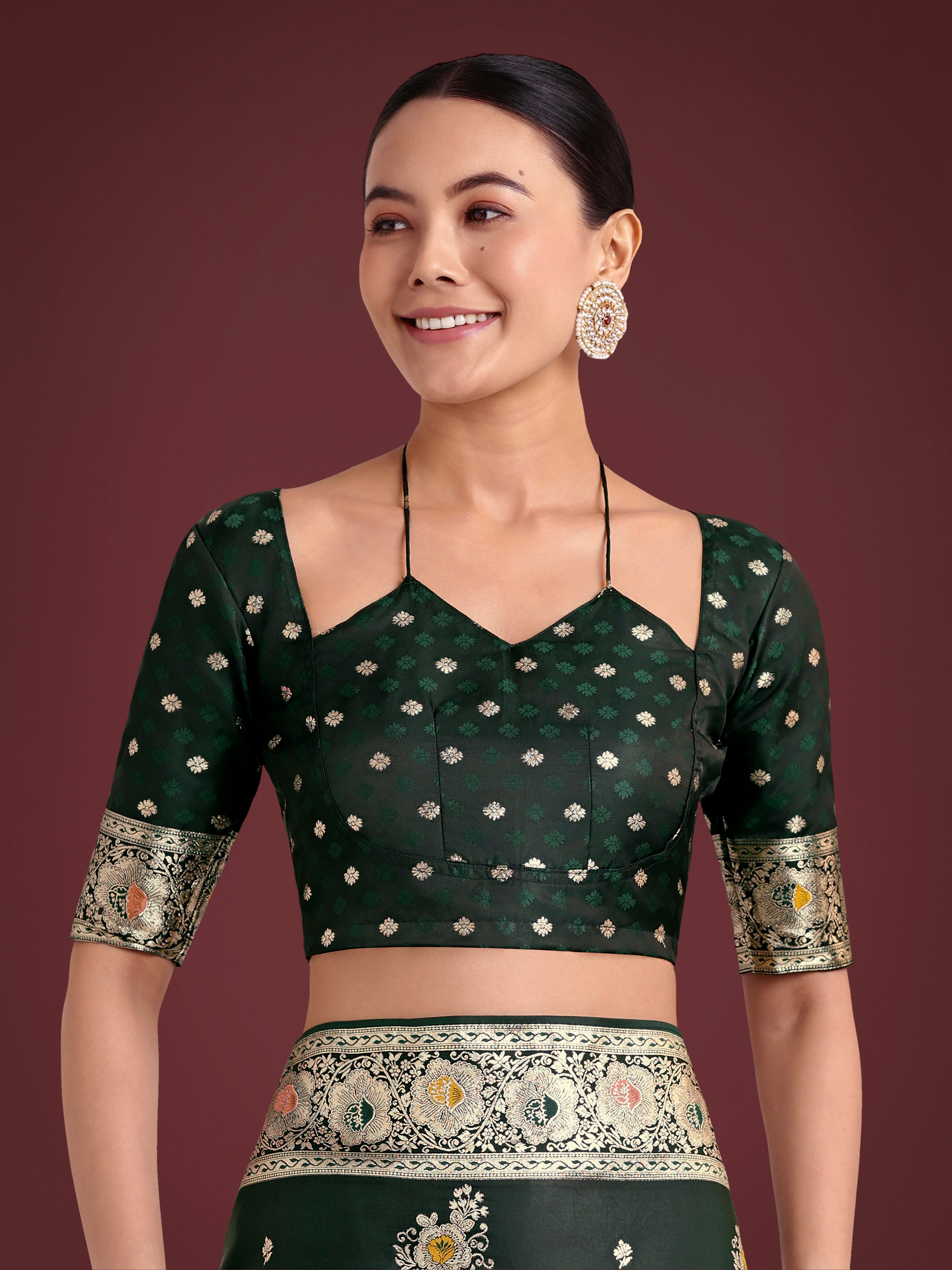 Monjolika Fashion Dark Green Glamour and Tradition With This Zari Woven Banarasi Satin Silk Saree