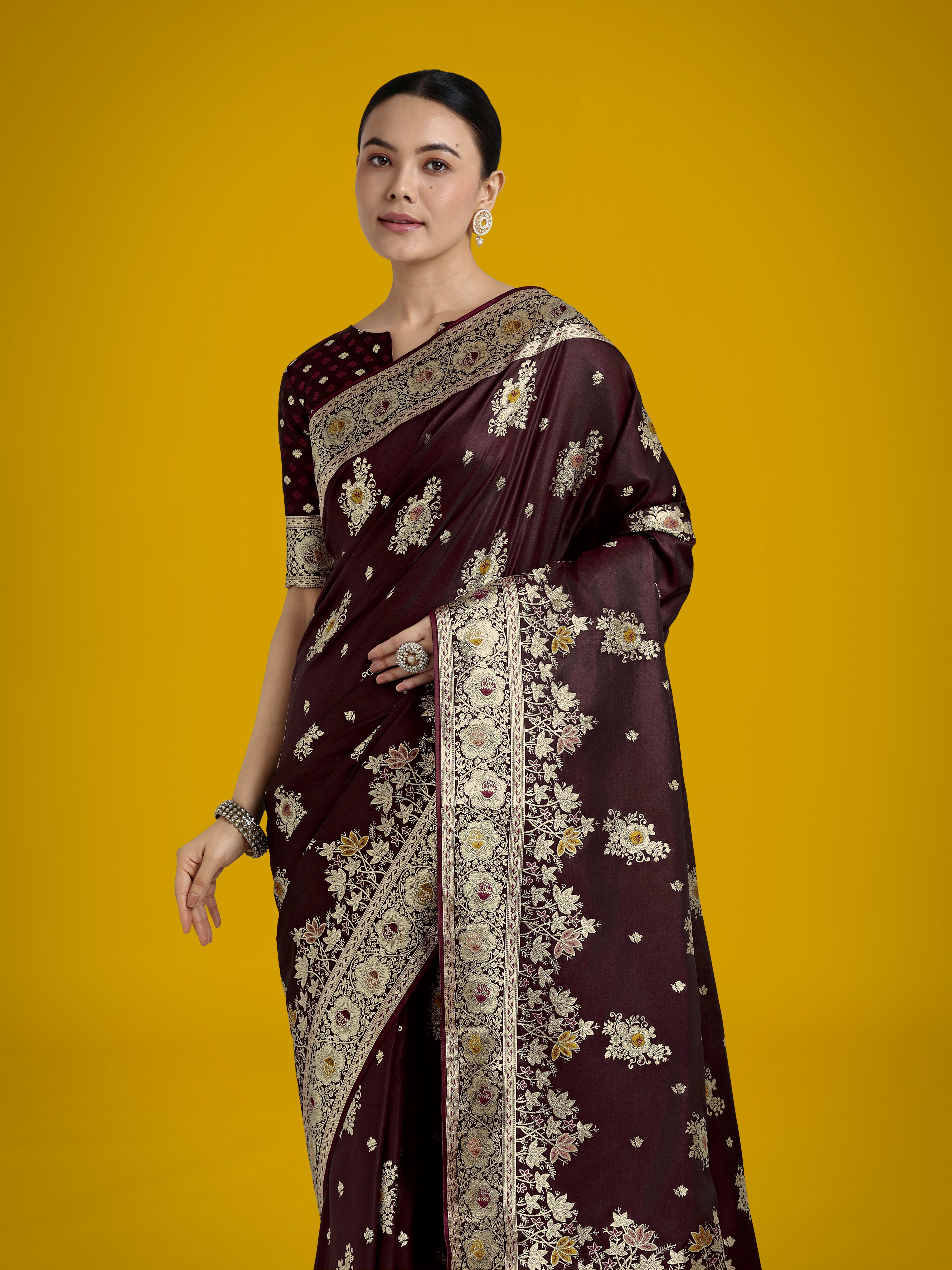Monjolika Fashion Dark Maroon Glamour and Tradition With This Zari Woven Banarasi Satin Silk Saree