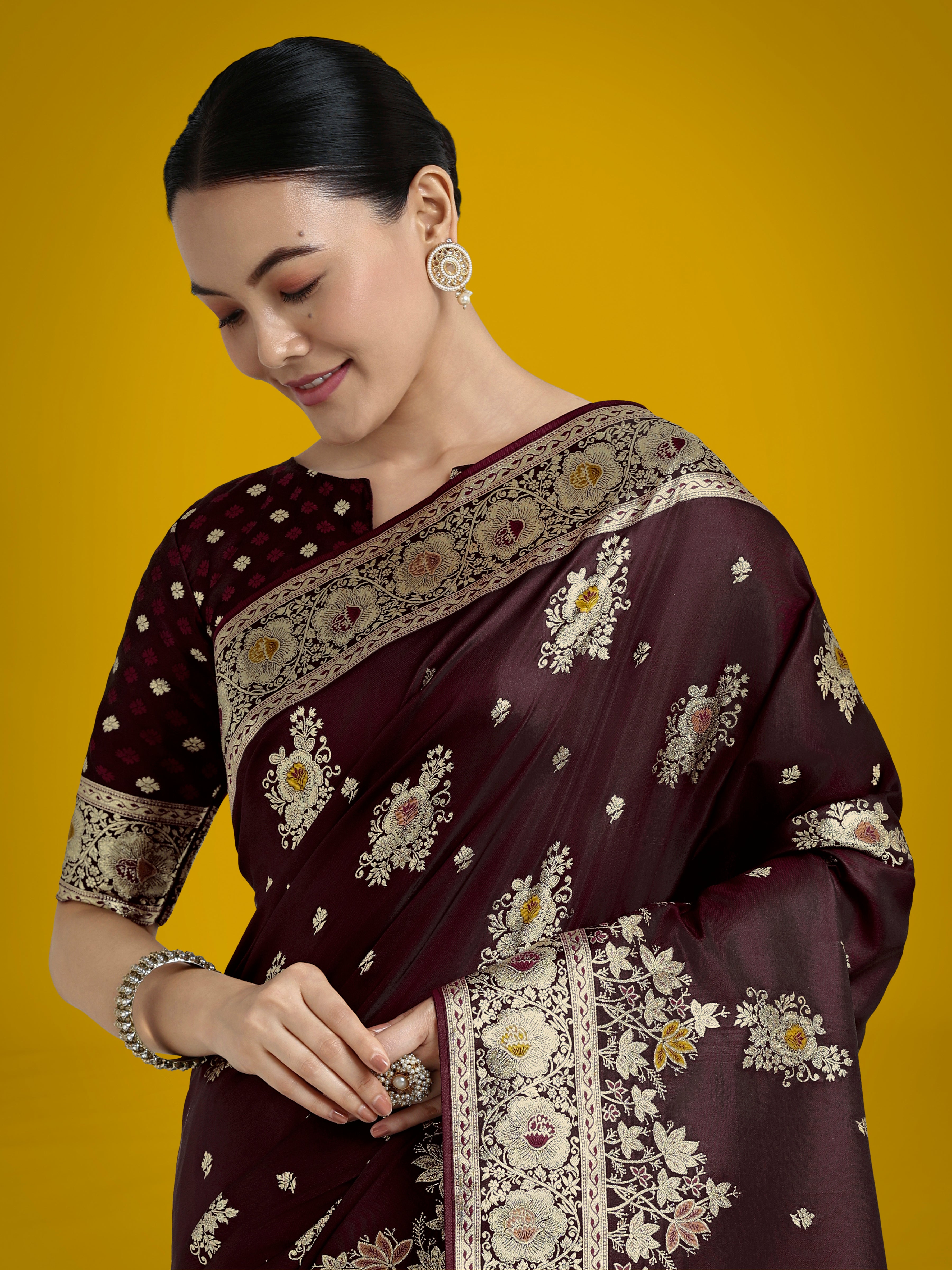 Monjolika Fashion Dark Maroon Glamour and Tradition With This Zari Woven Banarasi Satin Silk Saree