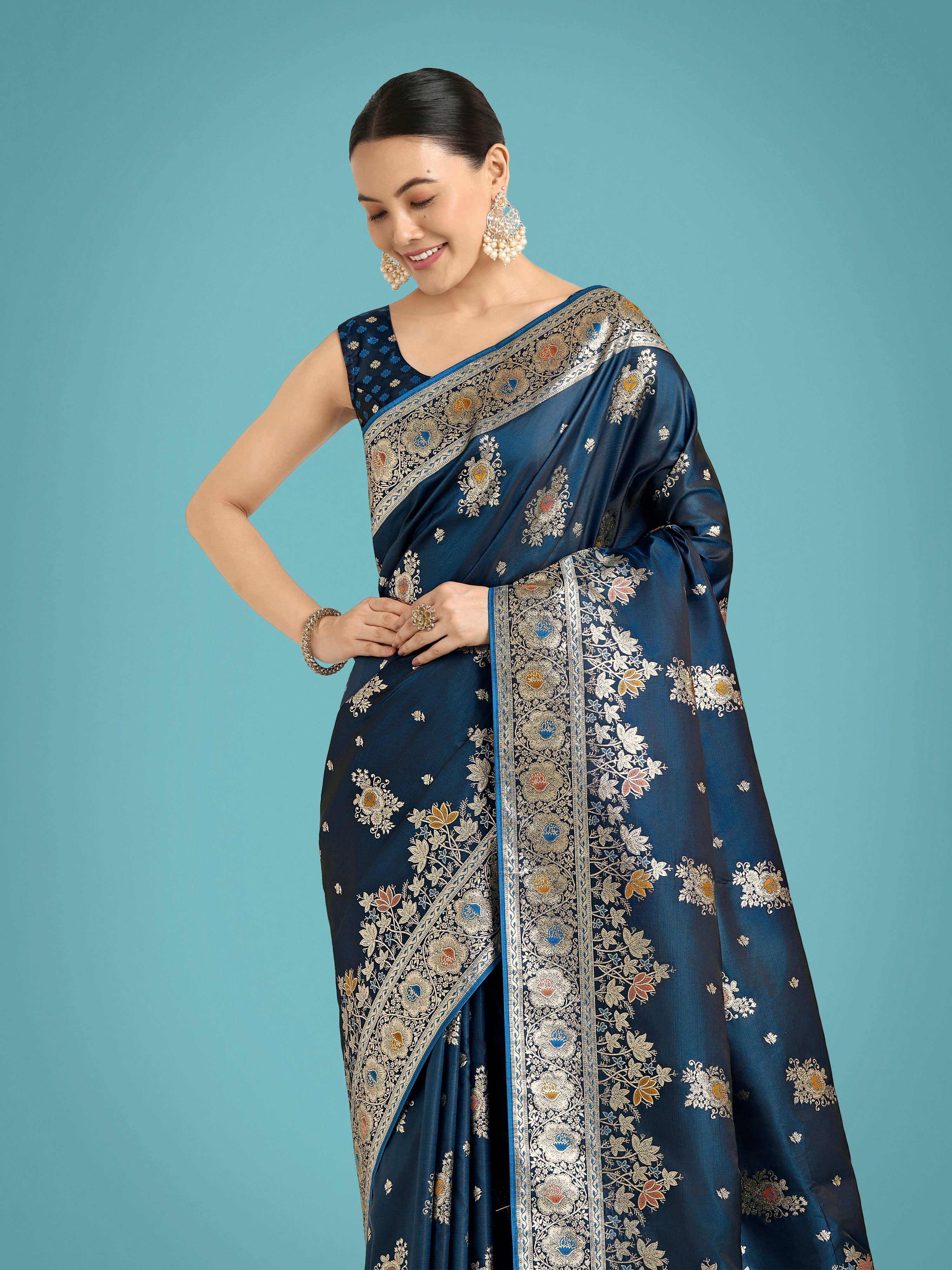 Monjolika Fashion Dark Teal Glamour and Tradition With This Zari Woven Banarasi Satin Silk Saree