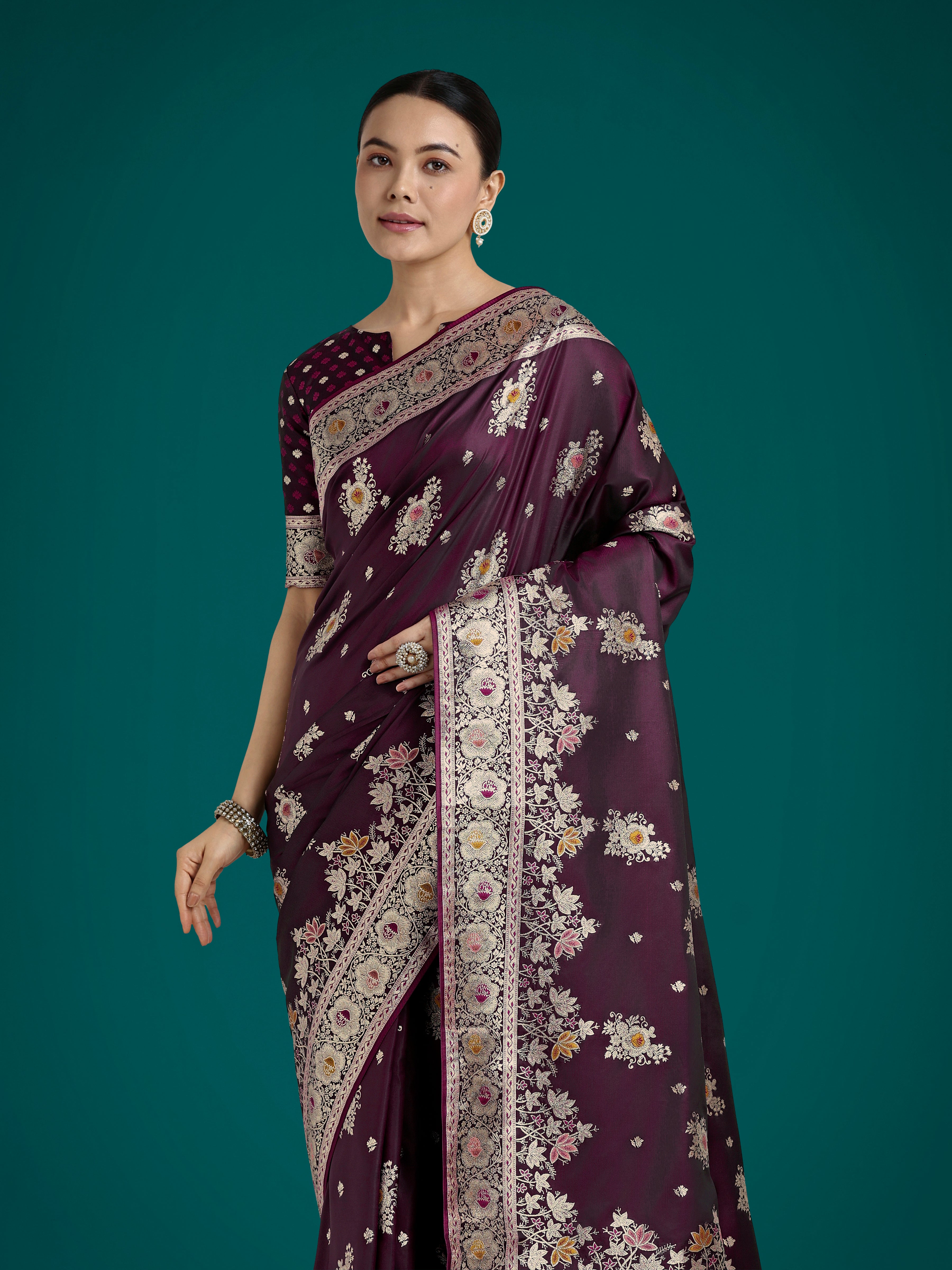 Monjolika Fashion Dark Wine Glamour and Tradition With This Zari Woven Banarasi Satin Silk Saree