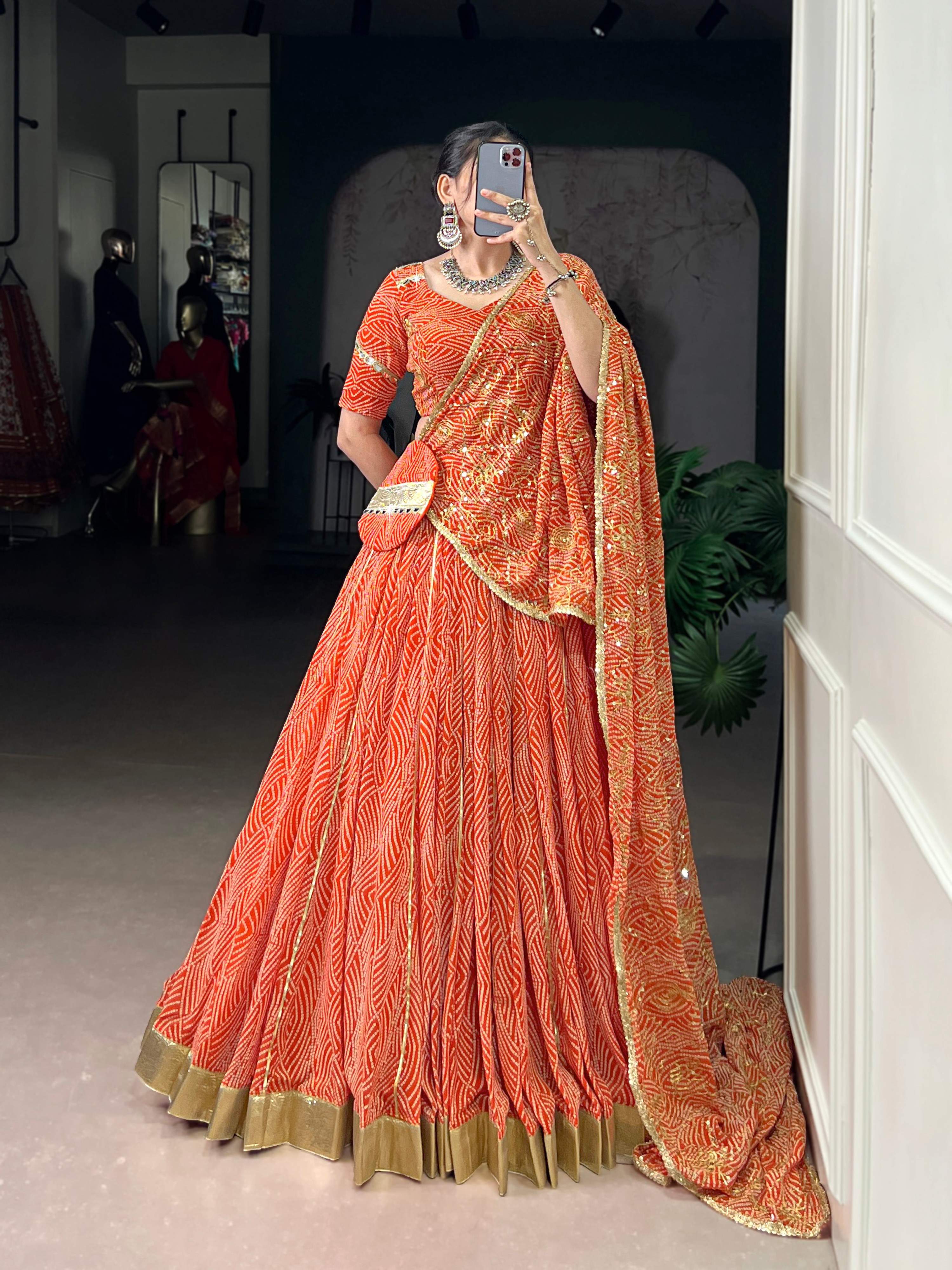 Lorenvalley Fashion Orange Georgette Bandhej Print and Embossed Design Lace with Gota Patti Touch Up Lehenga Choli with Dupatta