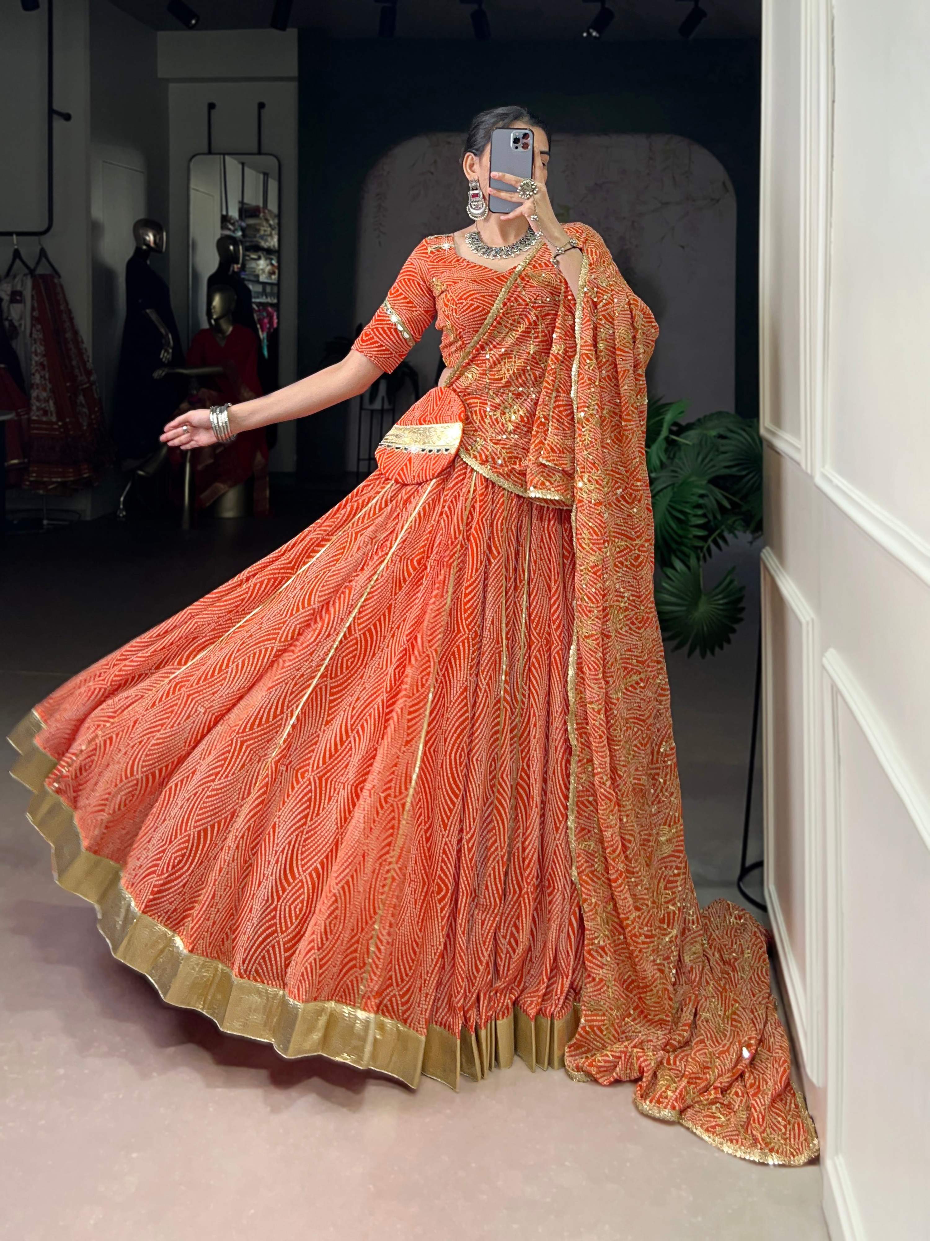 Lorenvalley Fashion Orange Georgette Bandhej Print and Embossed Design Lace with Gota Patti Touch Up Lehenga Choli with Dupatta