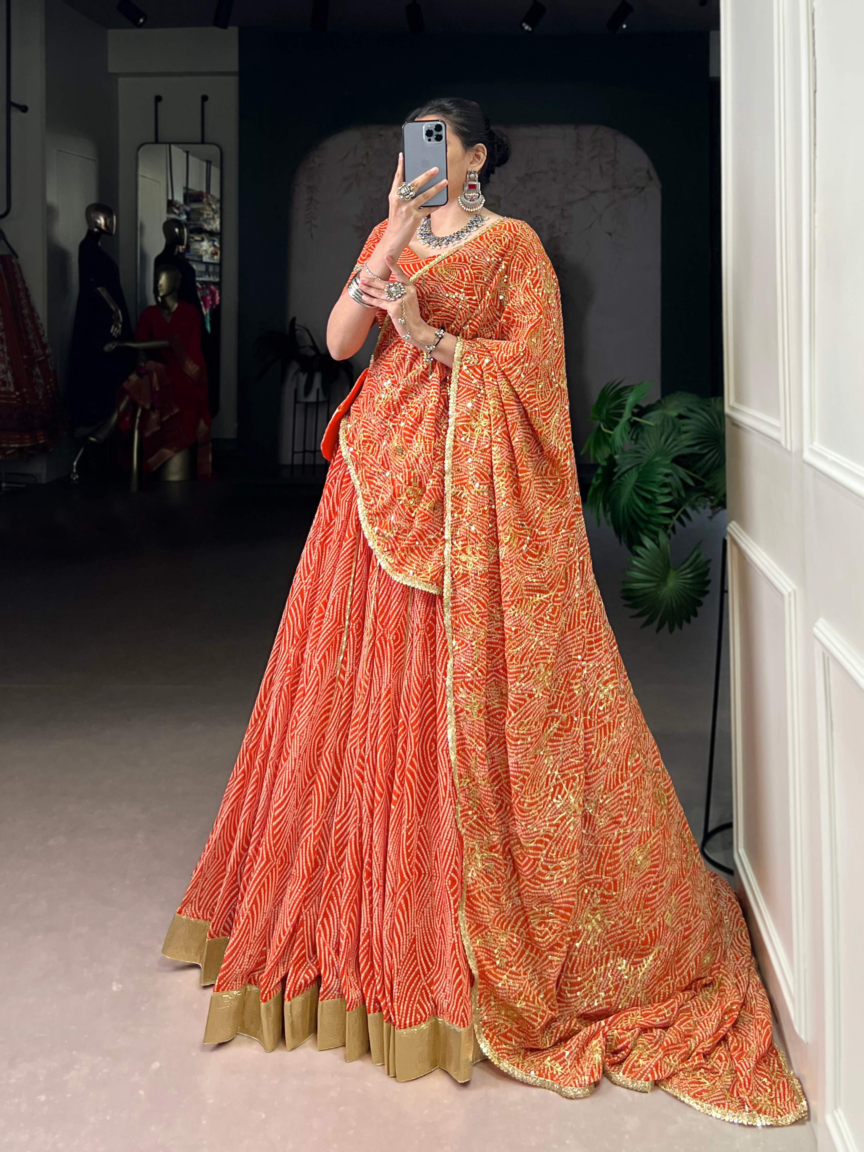 Lorenvalley Fashion Orange Georgette Bandhej Print and Embossed Design Lace with Gota Patti Touch Up Lehenga Choli with Dupatta