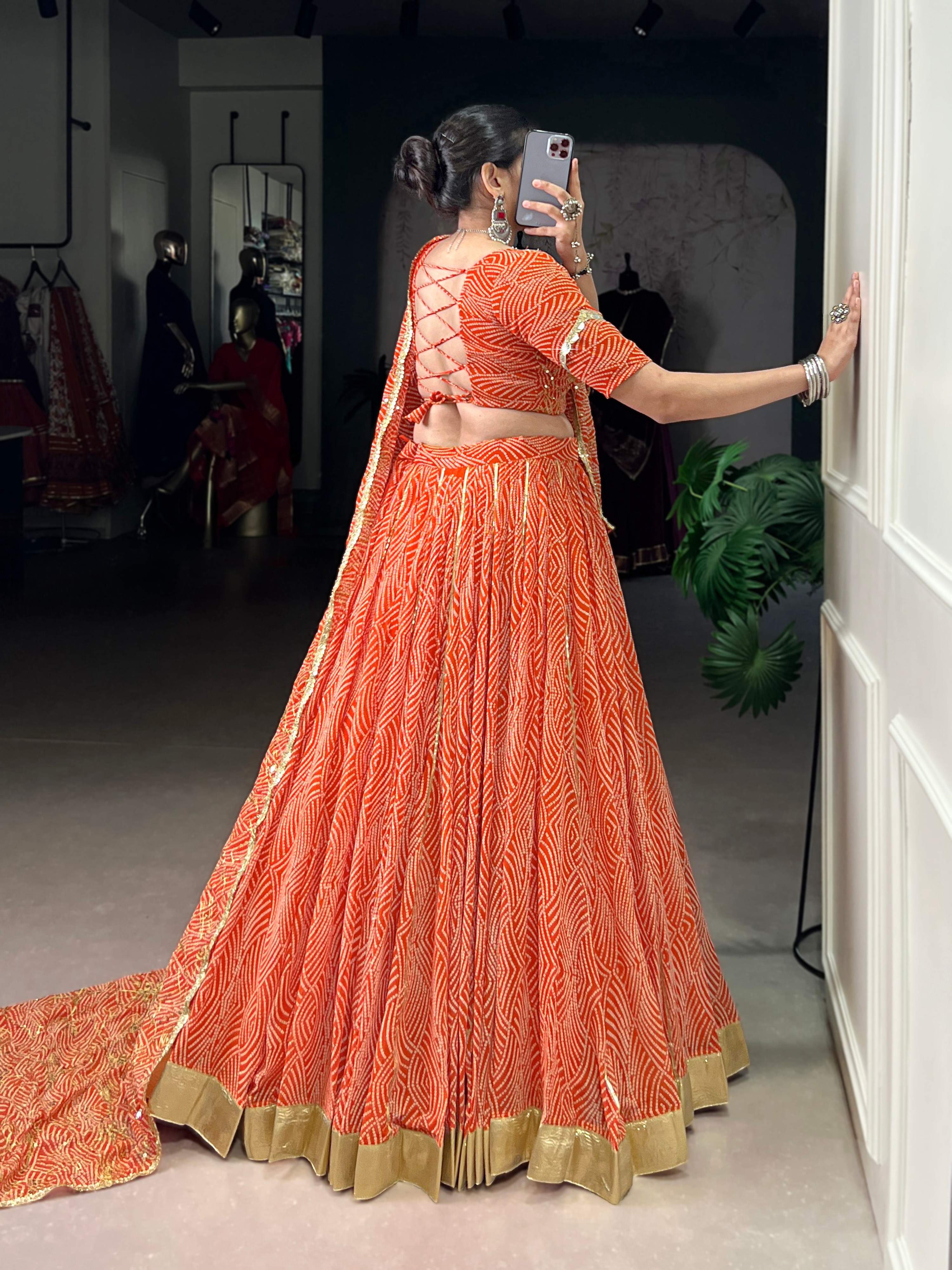 Lorenvalley Fashion Orange Georgette Bandhej Print and Embossed Design Lace with Gota Patti Touch Up Lehenga Choli with Dupatta