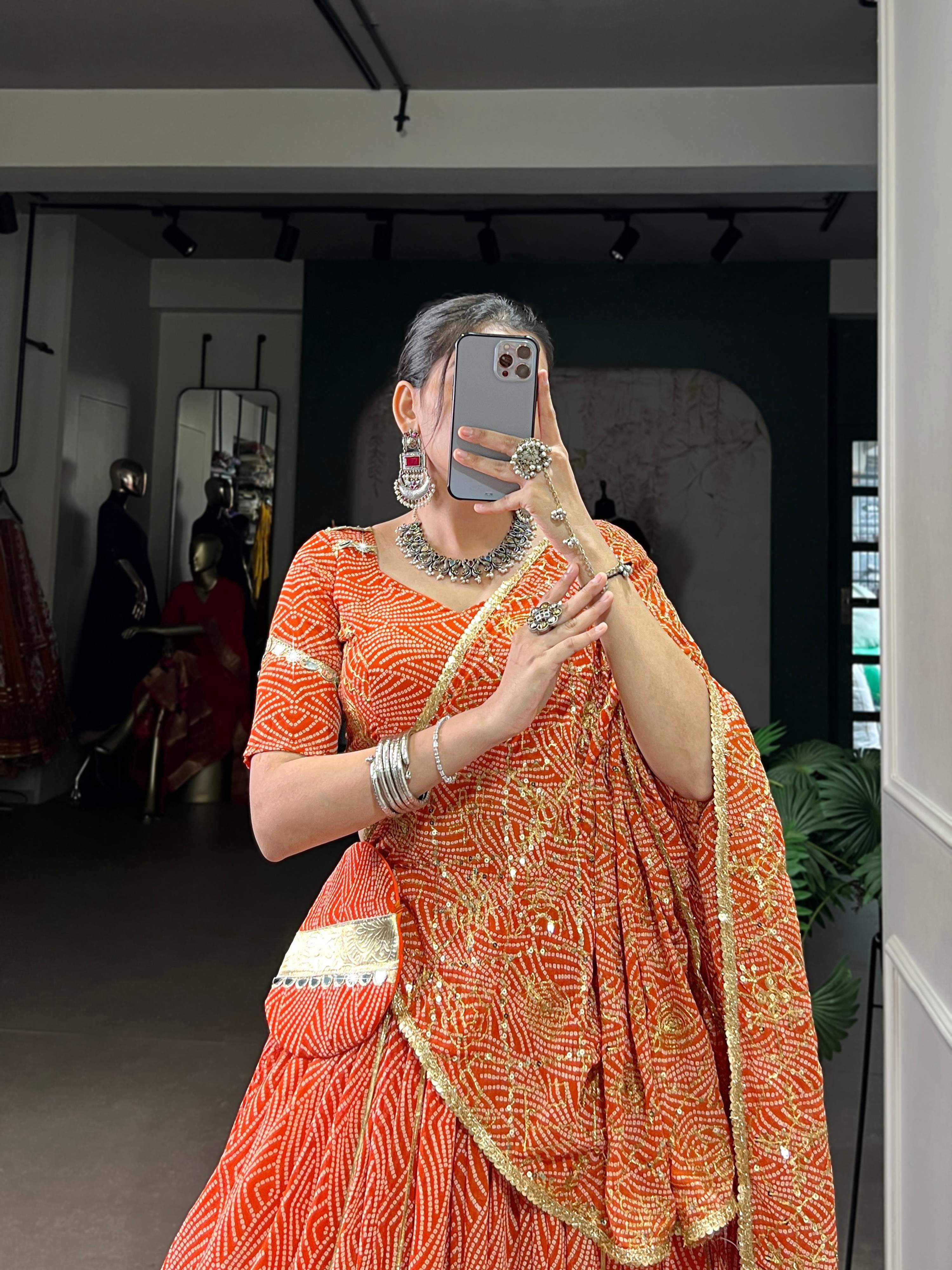 Lorenvalley Fashion Orange Georgette Bandhej Print and Embossed Design Lace with Gota Patti Touch Up Lehenga Choli with Dupatta