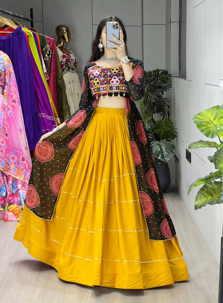 Yash Enterprise Mustard Black Rayon Cotton Embroidery Semi Stitched Navratri Chaniya Choli - Dista