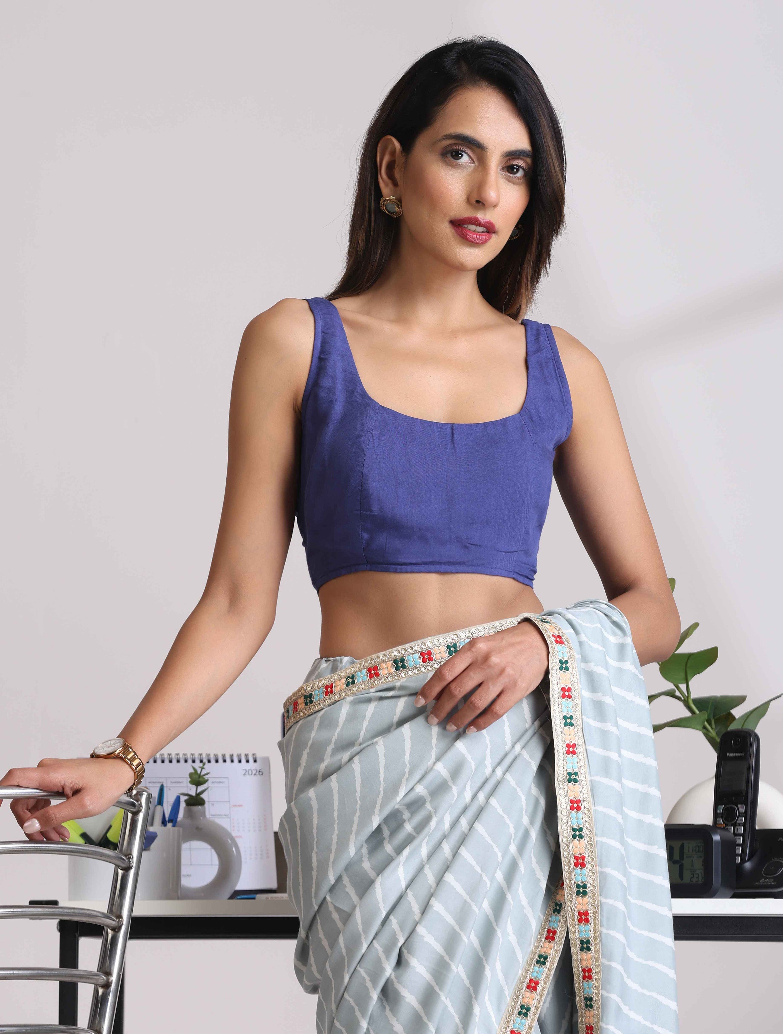 trueBrowns Blue Muslin Solid Sleeveless Blouse - Distacart