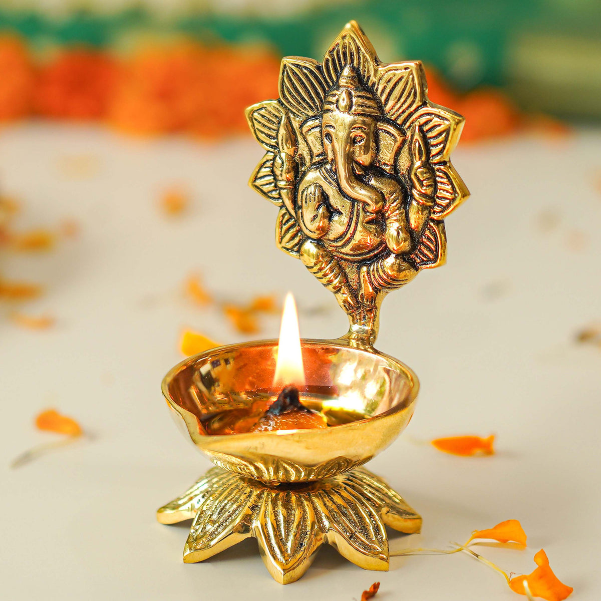 brass ganesh diya