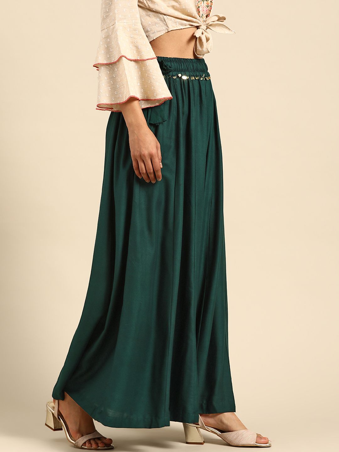 TAG 7 Women Green Solid Flared Palazzos - Distacart