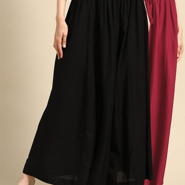 TAG 7 Women Black & Maroon Solid Flared Palazzos - Distacart