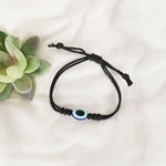 Thumbnail for NVR Women & Men Black Evil Eye Rakhi With Roli Chawal - Distacart