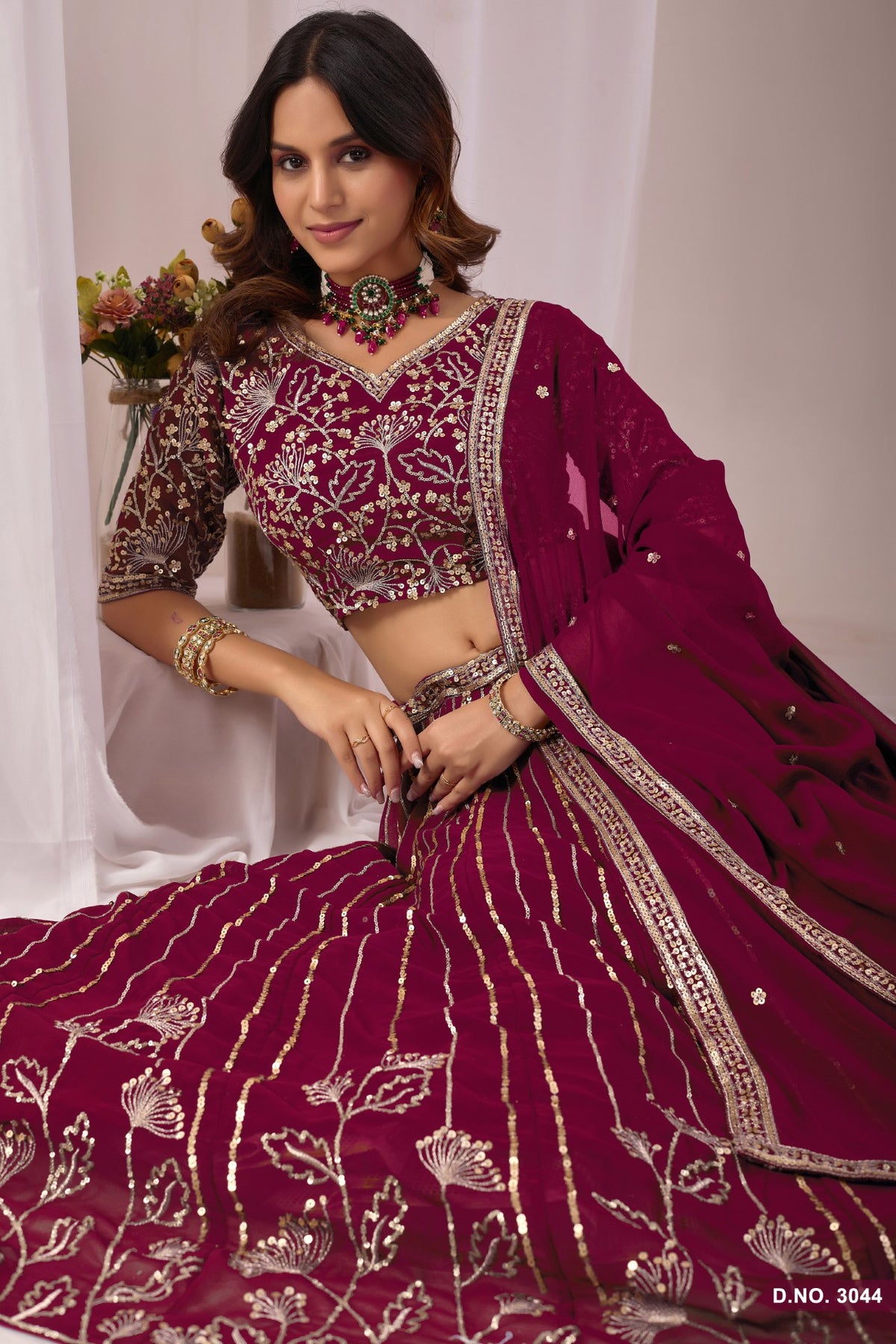 Anaita Maroon Faux Georgette Semi Stitched Lehenga Choli With Embroidered & Sequence Work