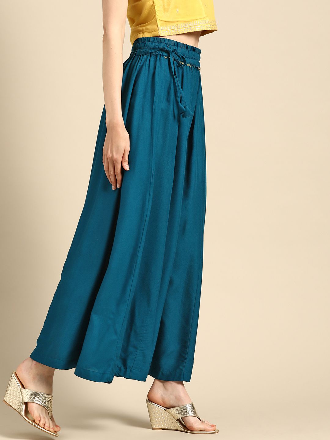 TAG 7 Women Teal Blue Solid Flared Palazzos - Distacart