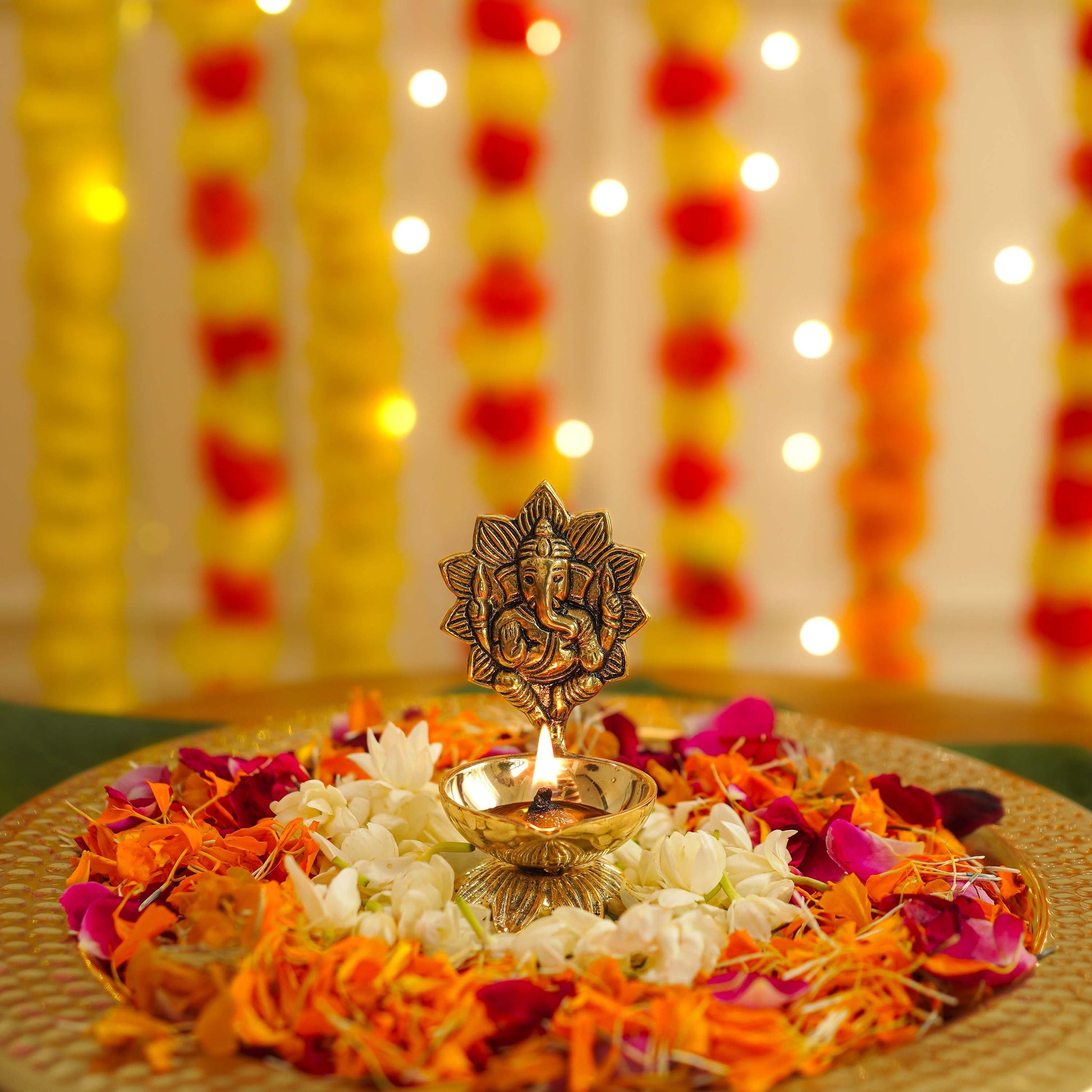 brass ganesh diya