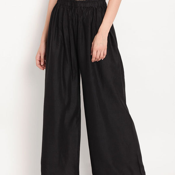 TAG 7 Women Black Solid Flared Palazzos - Distacart
