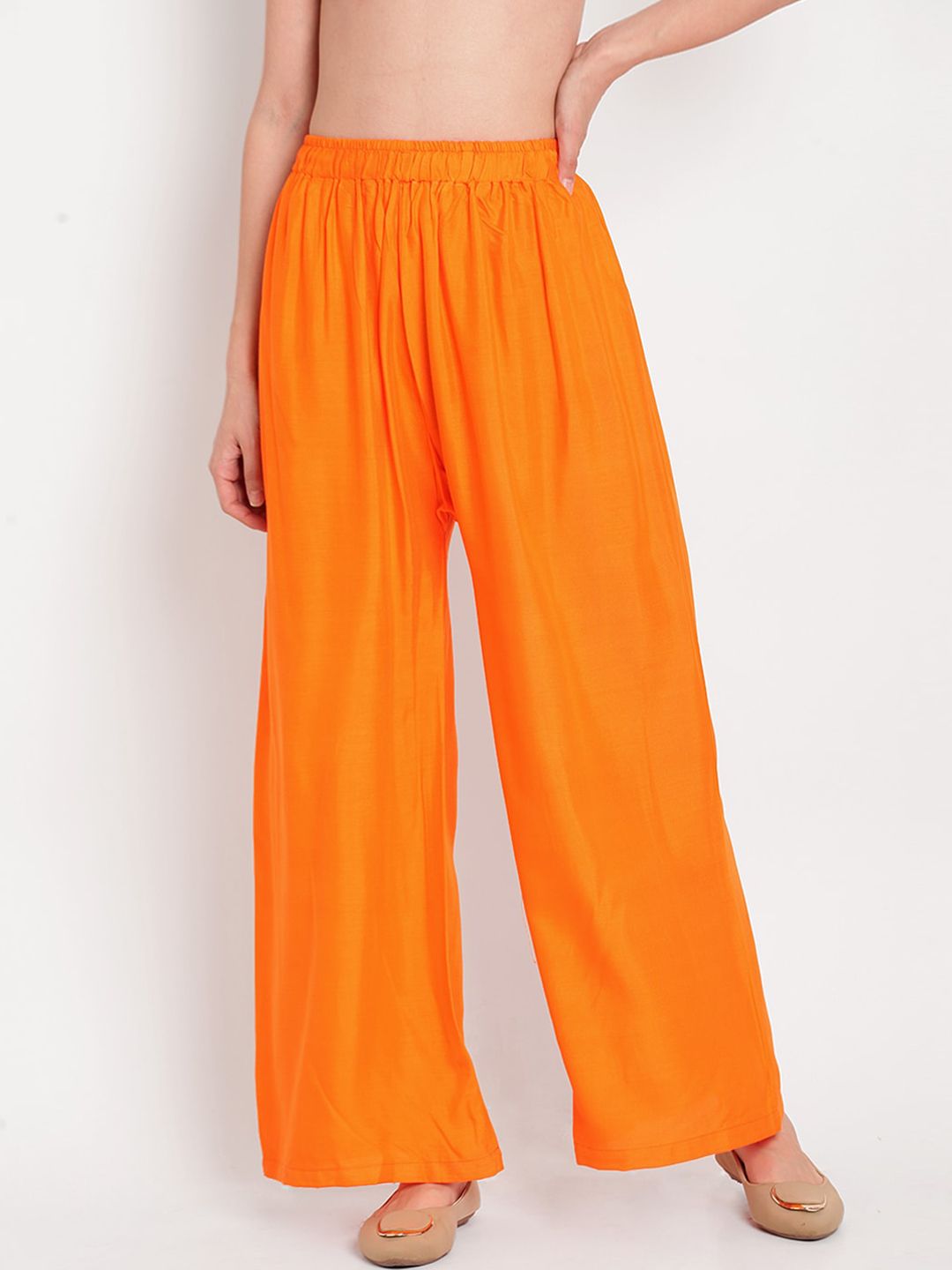 TAG 7 Women Orange Solid Flared Palazzos - Distacart