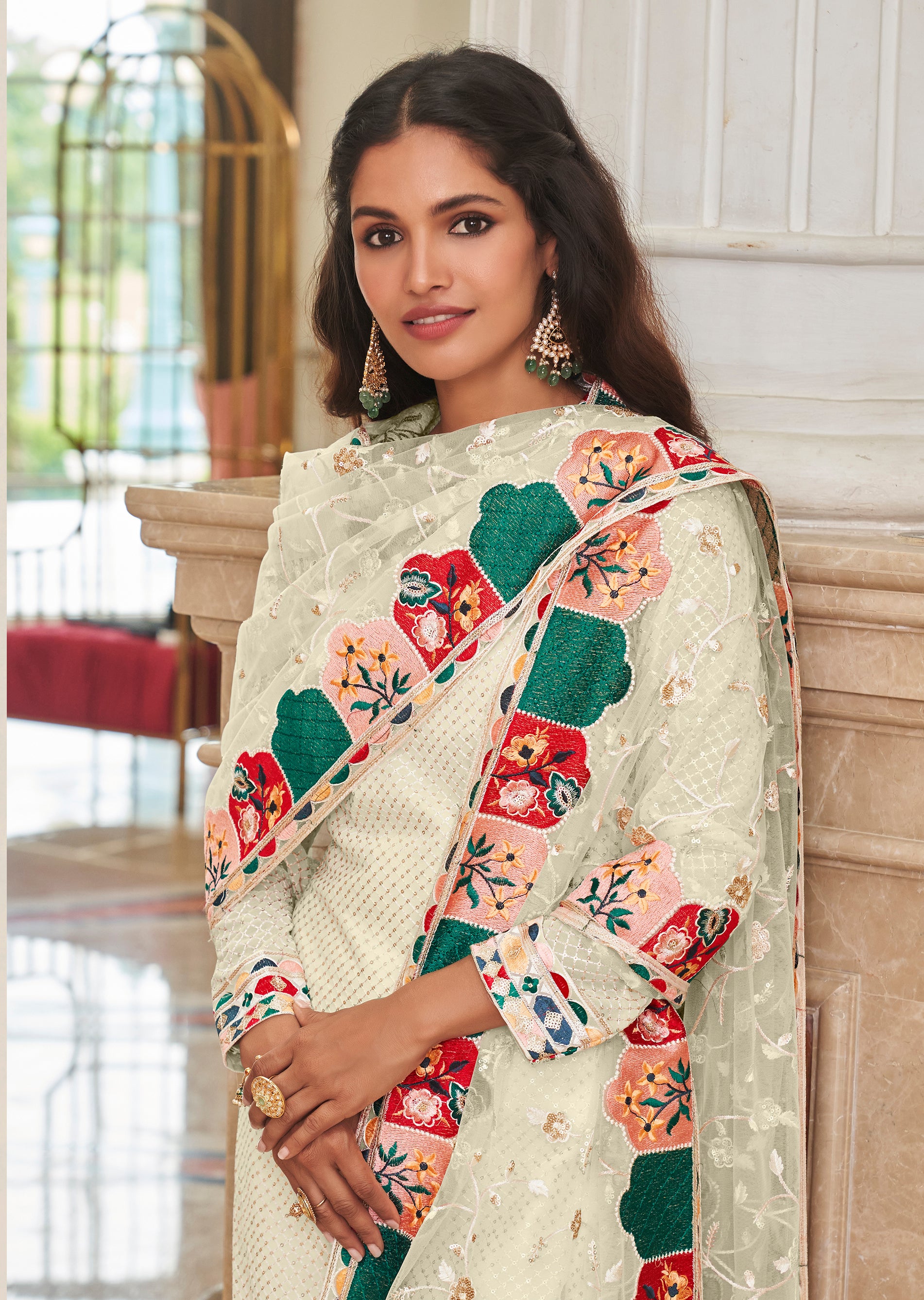 Monjolika Fashion Cream Embroidered Georgette Churidar Salwar Suit