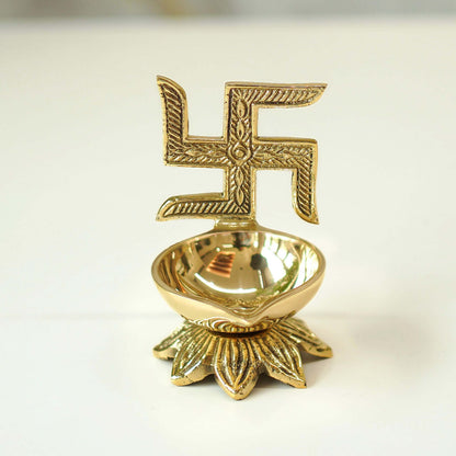swastik brass diya