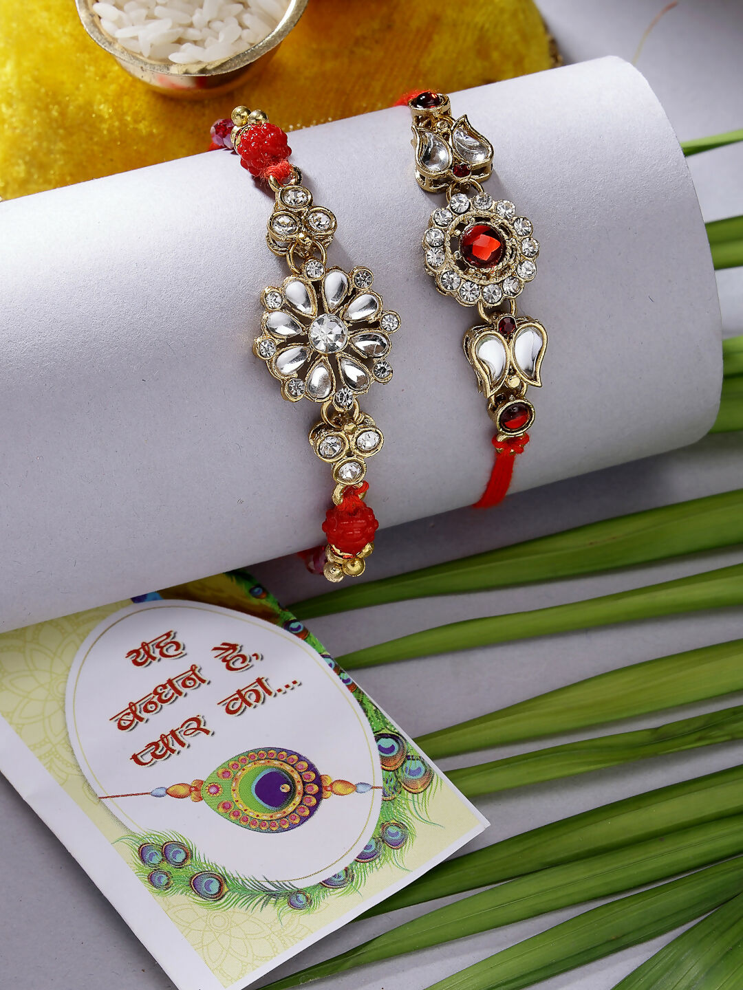 NVR Men Set of 2 Gold-Toned Stone-Studded Rakhi With Roli Chawal & Chocolate - Distacart