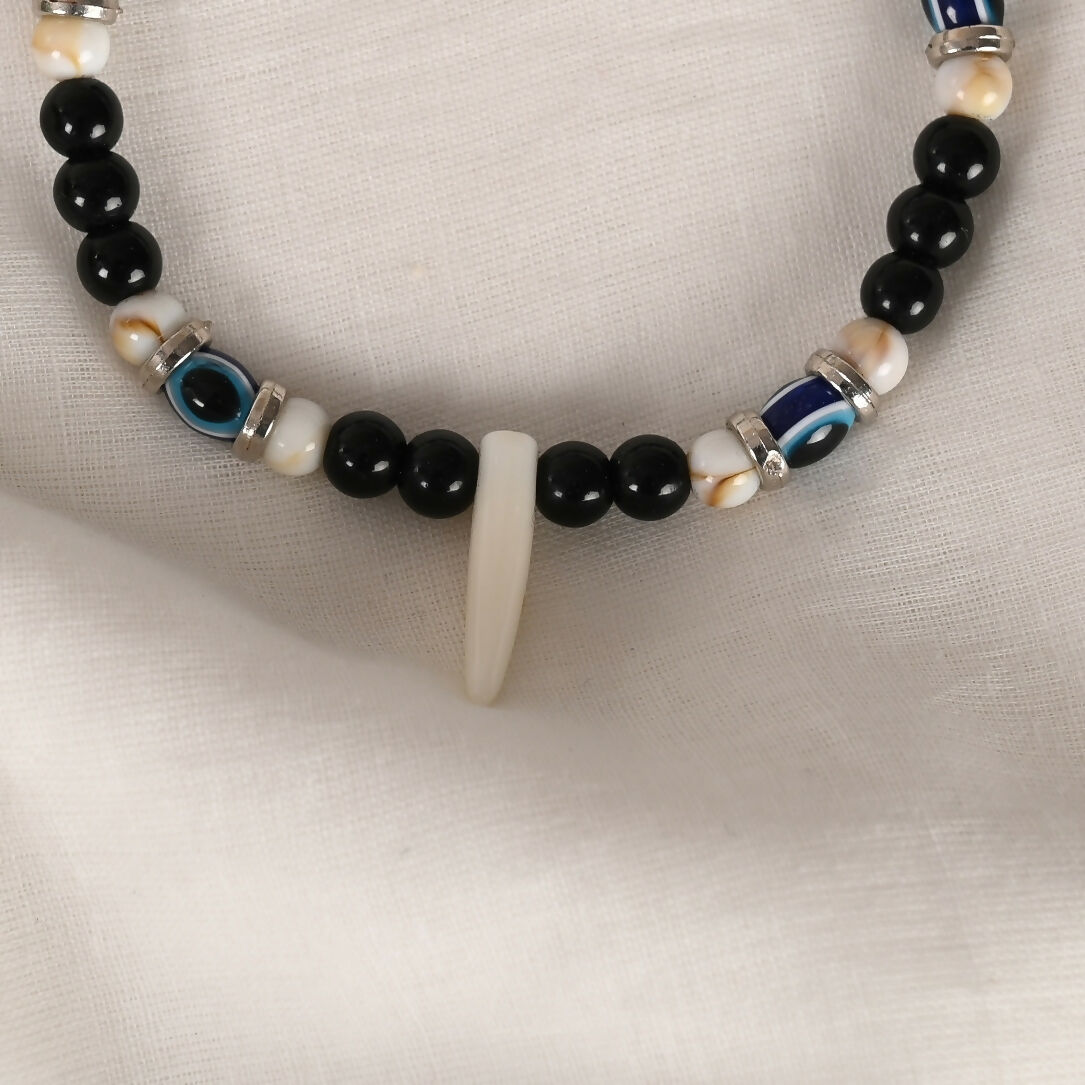 NVR Women & Men Black Evil Eye Rakhi With Roli Chawal - Distacart