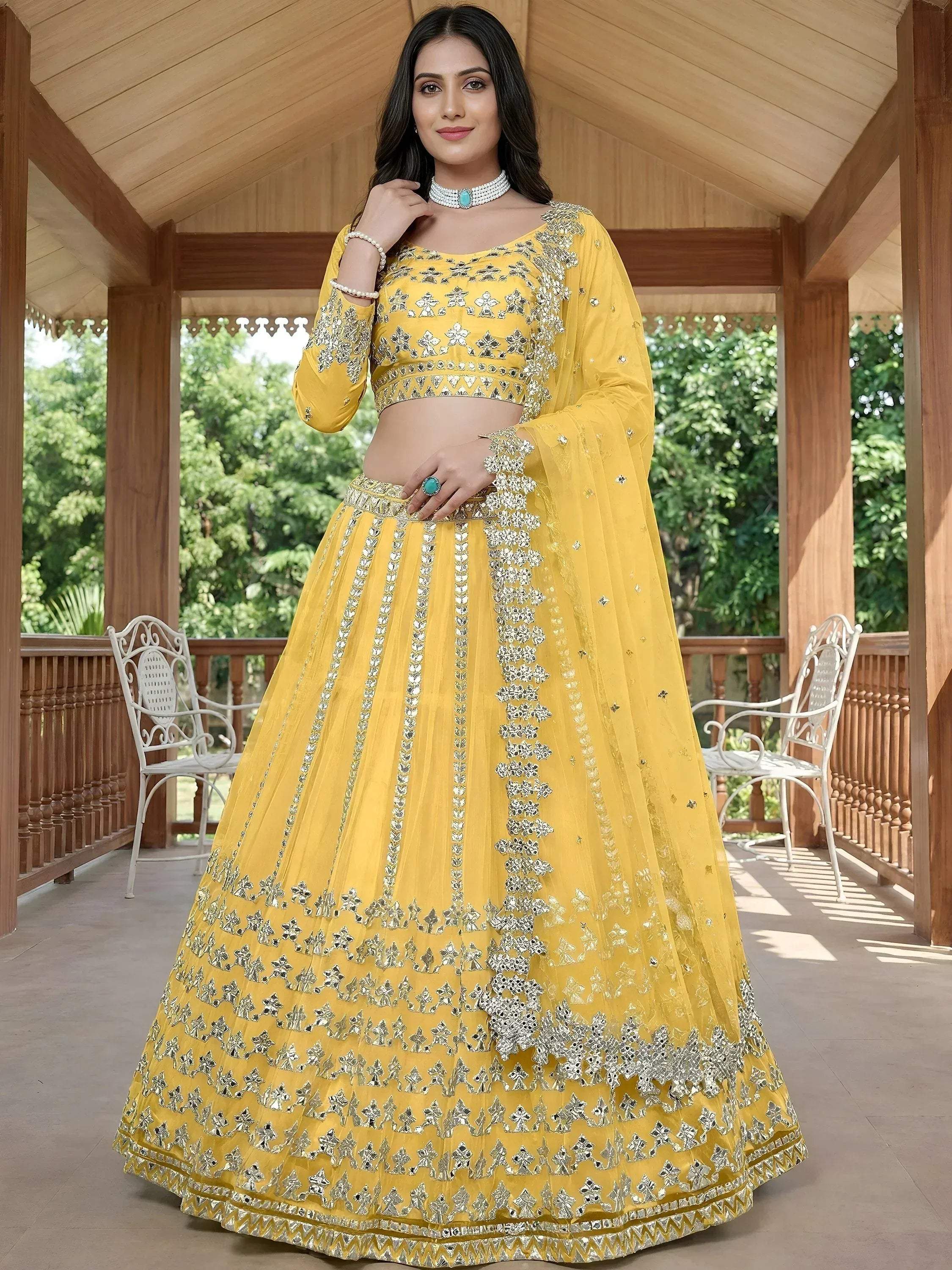 Tulsi Art Captivating Yellow Foil Work Net Sangeet Wear Lehenga Choli - Dista
