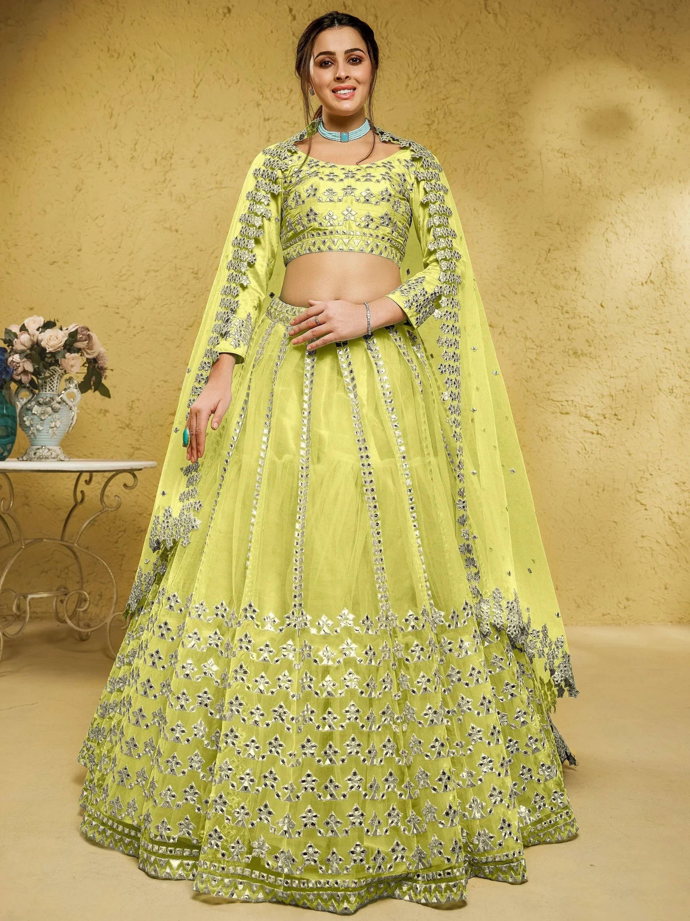 Tulsi Art Captivating Lime Yellow Foil Work Net Engagement Wear Lehenga Choli - Dista