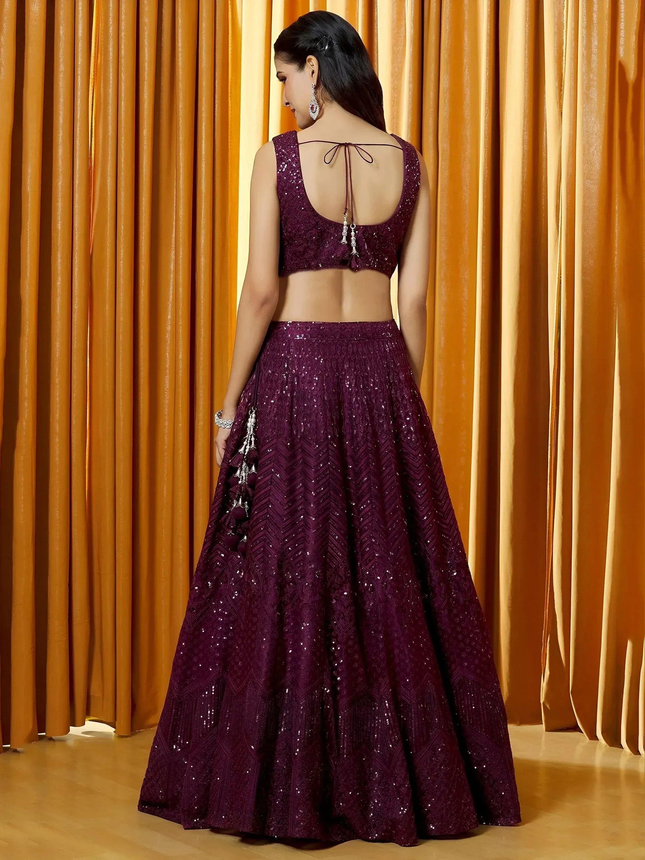 Tulsi Art Marvelousâ Wine Thread Embroidered Net Reception Wear Lehenga Choli