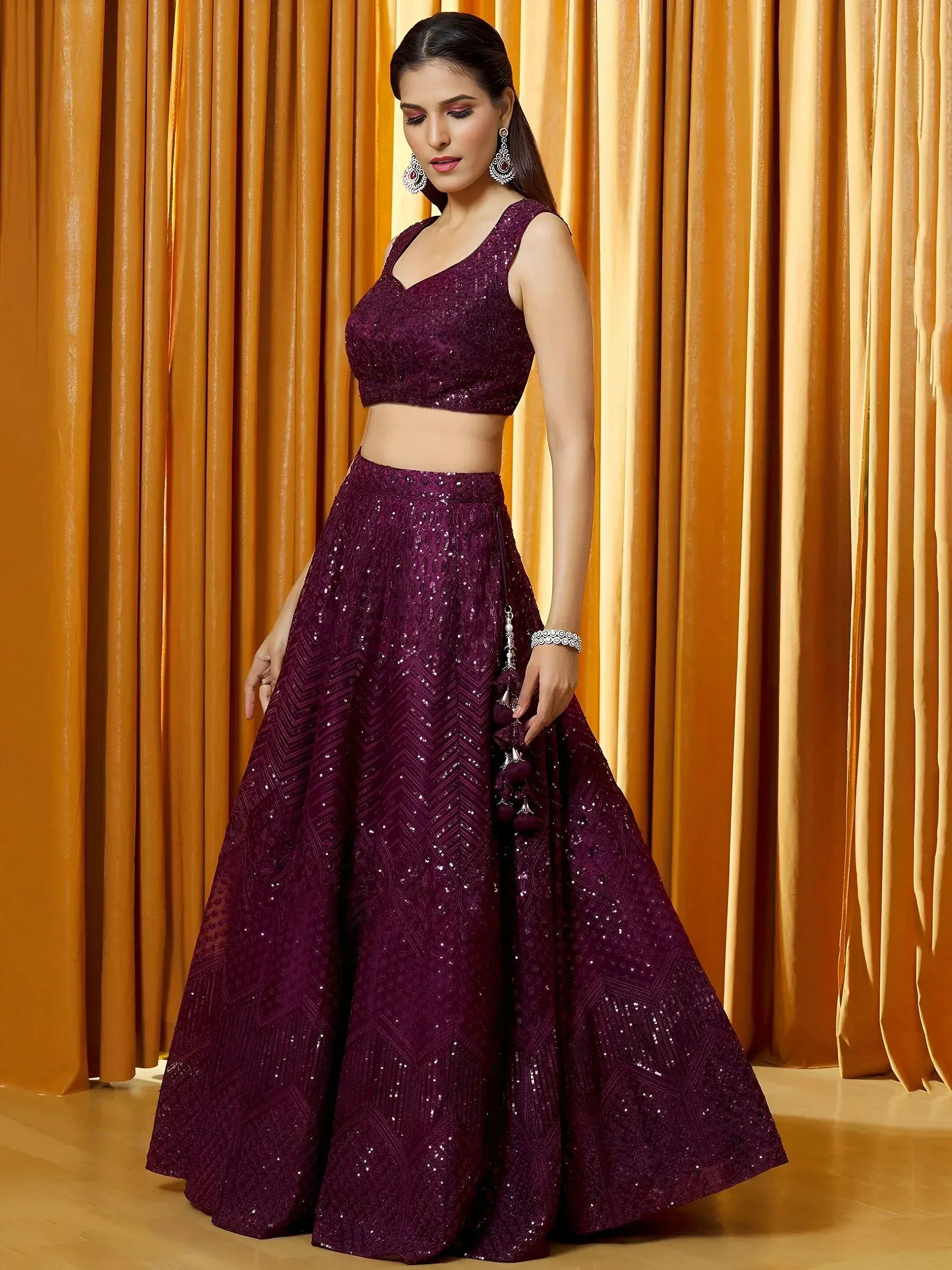 Tulsi Art Marvelousâ Wine Thread Embroidered Net Reception Wear Lehenga Choli