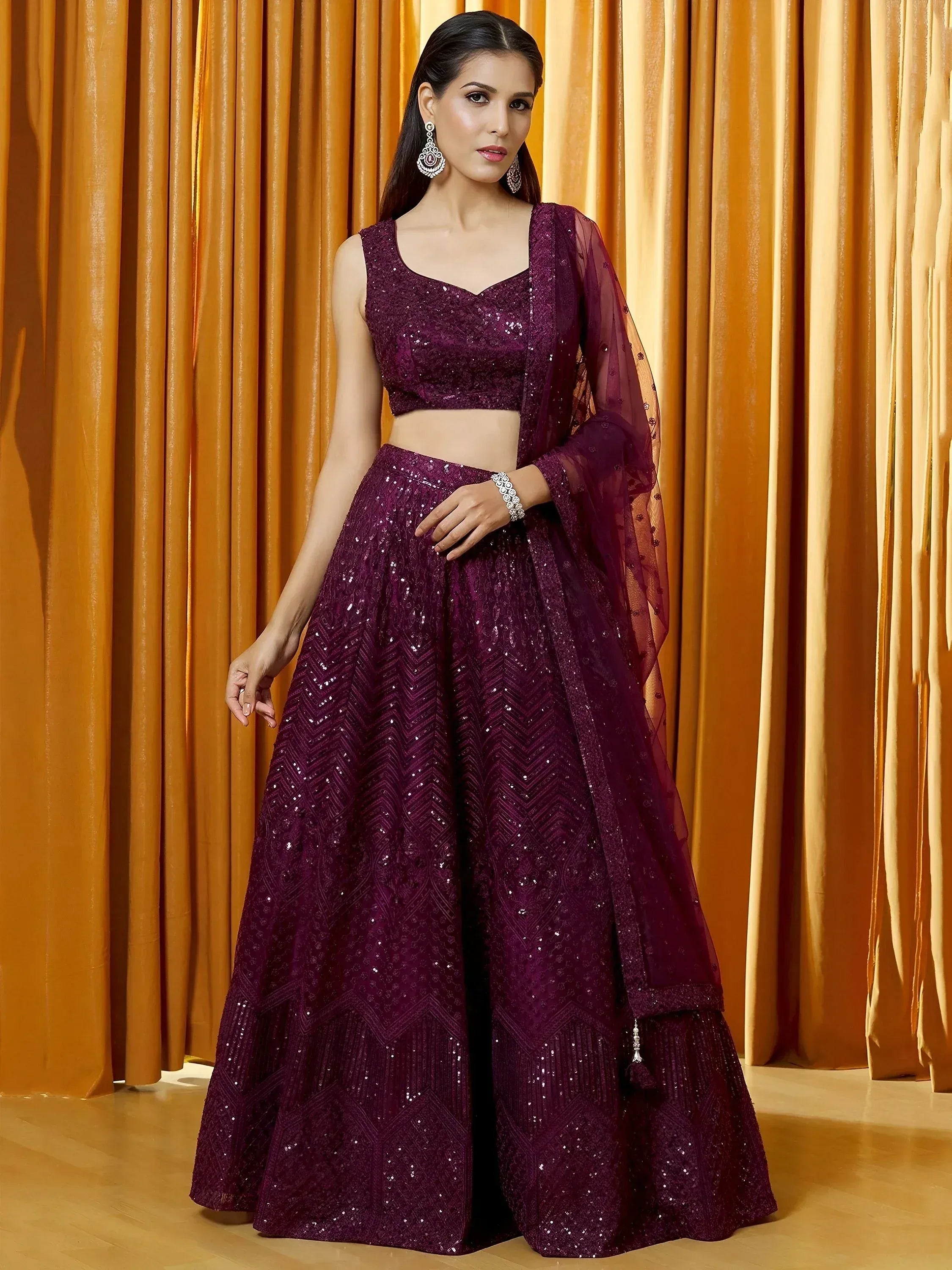 Tulsi Art Marvelousâ Wine Thread Embroidered Net Reception Wear Lehenga Choli