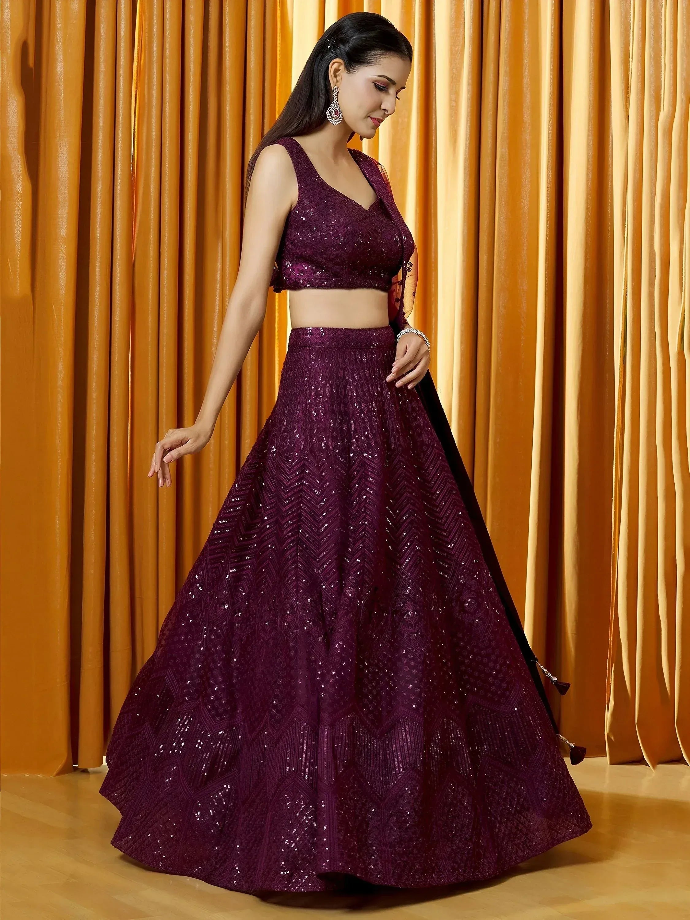 Tulsi Art Marvelousâ Wine Thread Embroidered Net Reception Wear Lehenga Choli