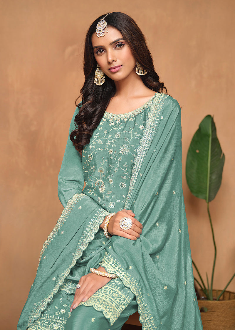 Monjolika Fashion Turquoise Color Embroidered Santoon Chinnon Salwar Suit