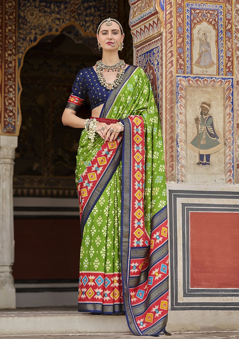 Monjolika Fashion Parrot Green And Red Patola Print Silk Festival Trendy Saree
