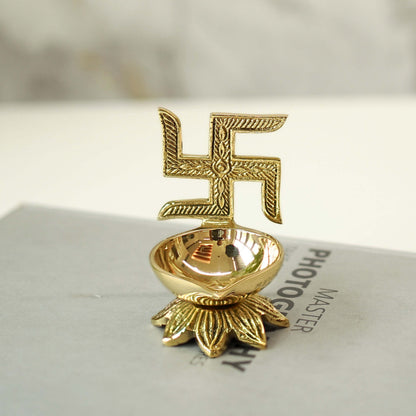 swastik brass diya
