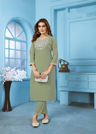 Monjolika Fashion Sage Green Rinkal Cotton With Embroidered Work Kurti With Pant