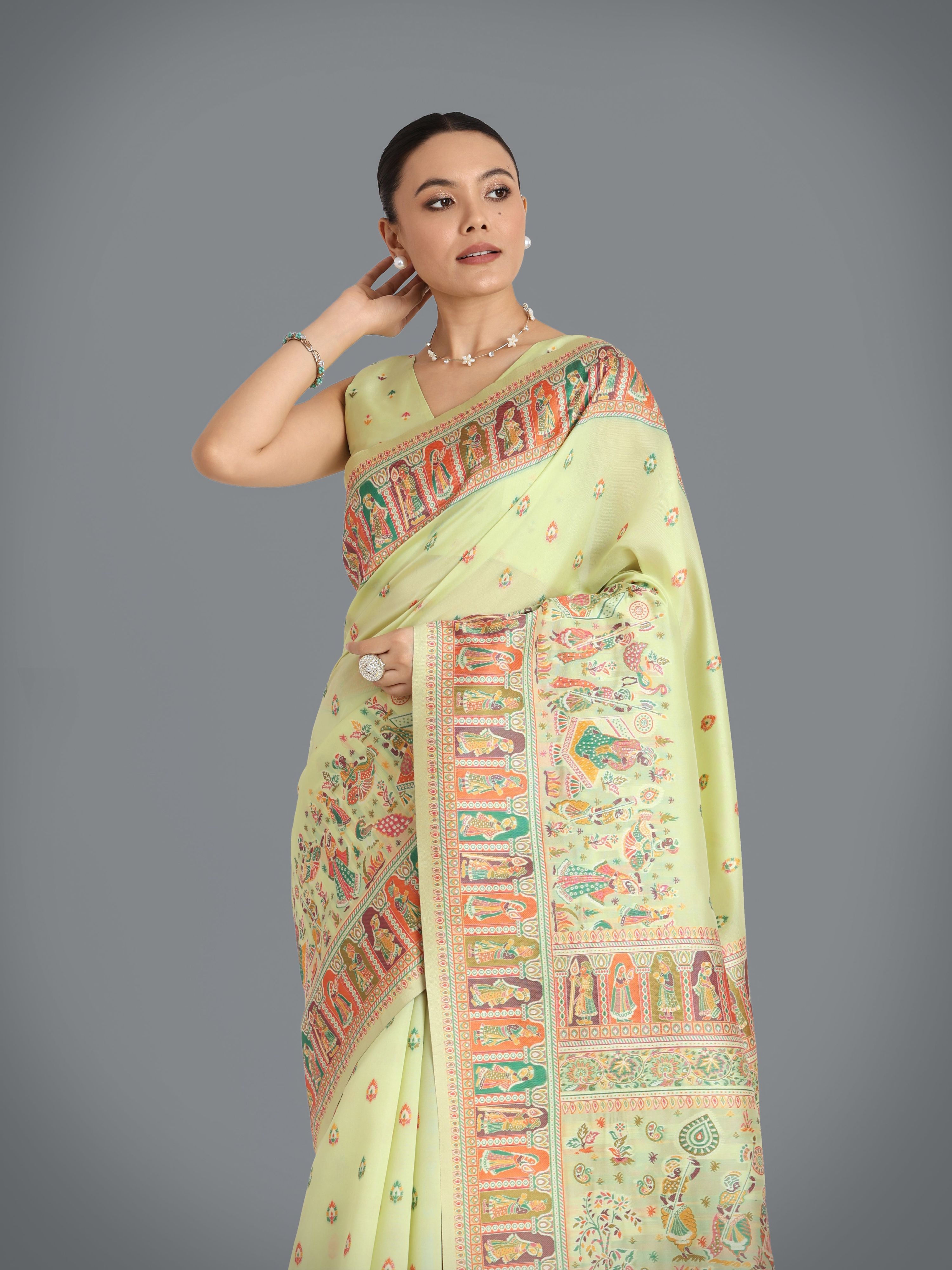 Monjolika Fashion Pashmina Silk Pista Gold Zari Woven Saree?
