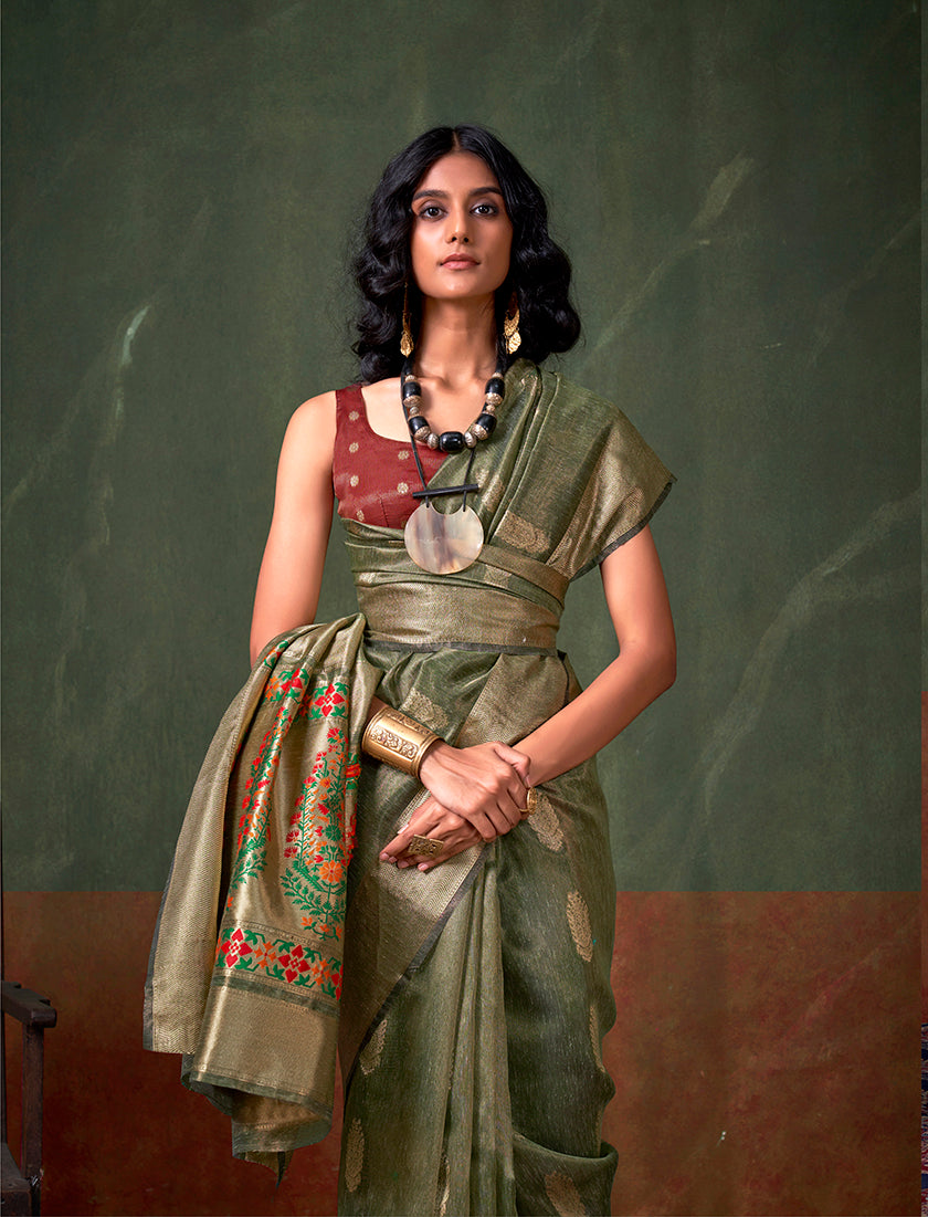 Monjolika Fashion Weaving Zari Tissue Silk Designer Saree In Dark Green