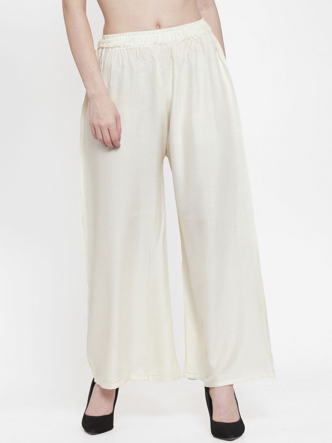 TAG 7 Women Off-White Solid Flared Palazzos - Distacart