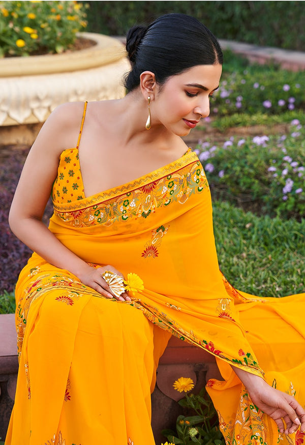 Monjolika Fashion Yellow Printed Georgette Contemporary Saree