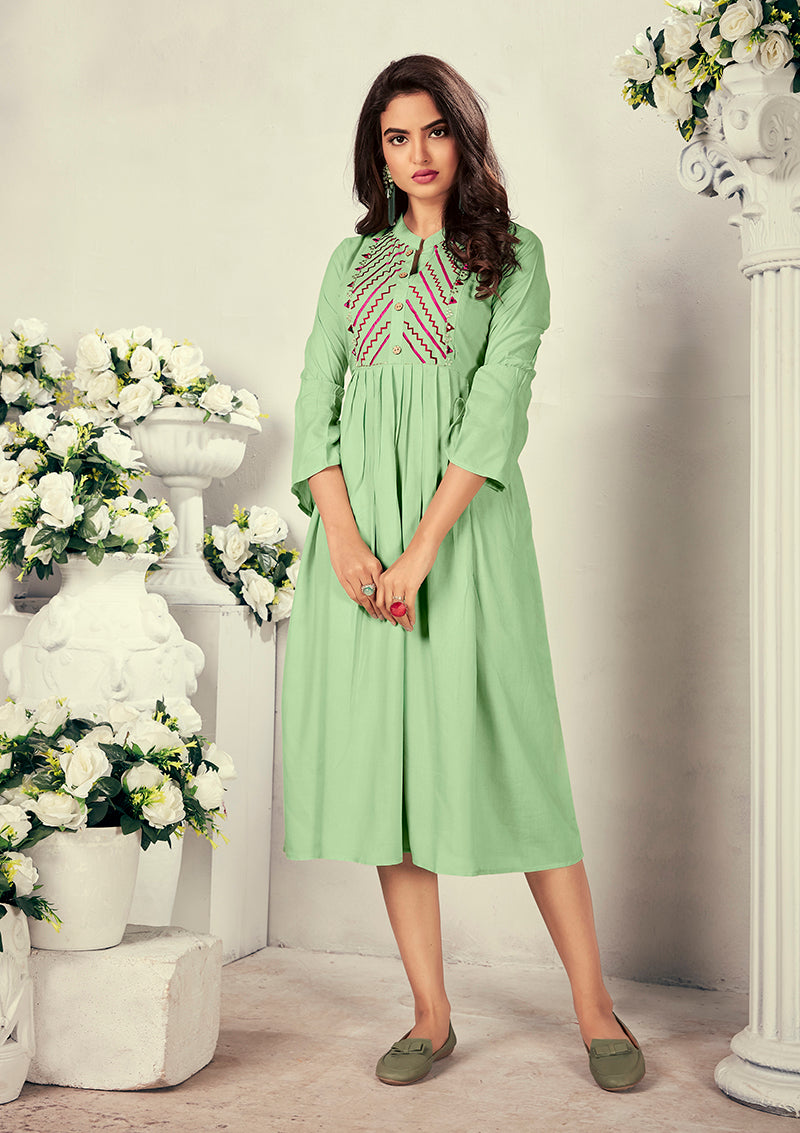 Monjolika Fashion Fancy Festive Wear Pista Green Color Rayon Fabric Thread Embroidered Kurti
