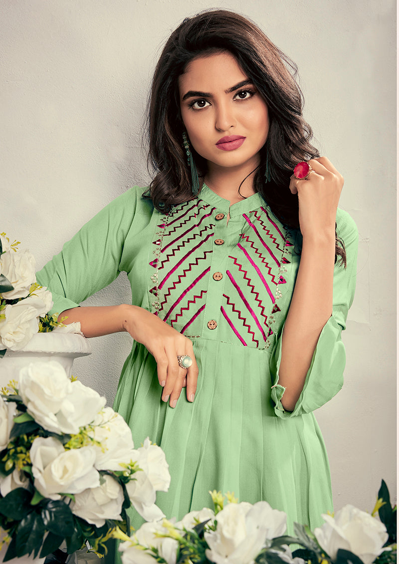 Monjolika Fashion Fancy Festive Wear Pista Green Color Rayon Fabric Thread Embroidered Kurti